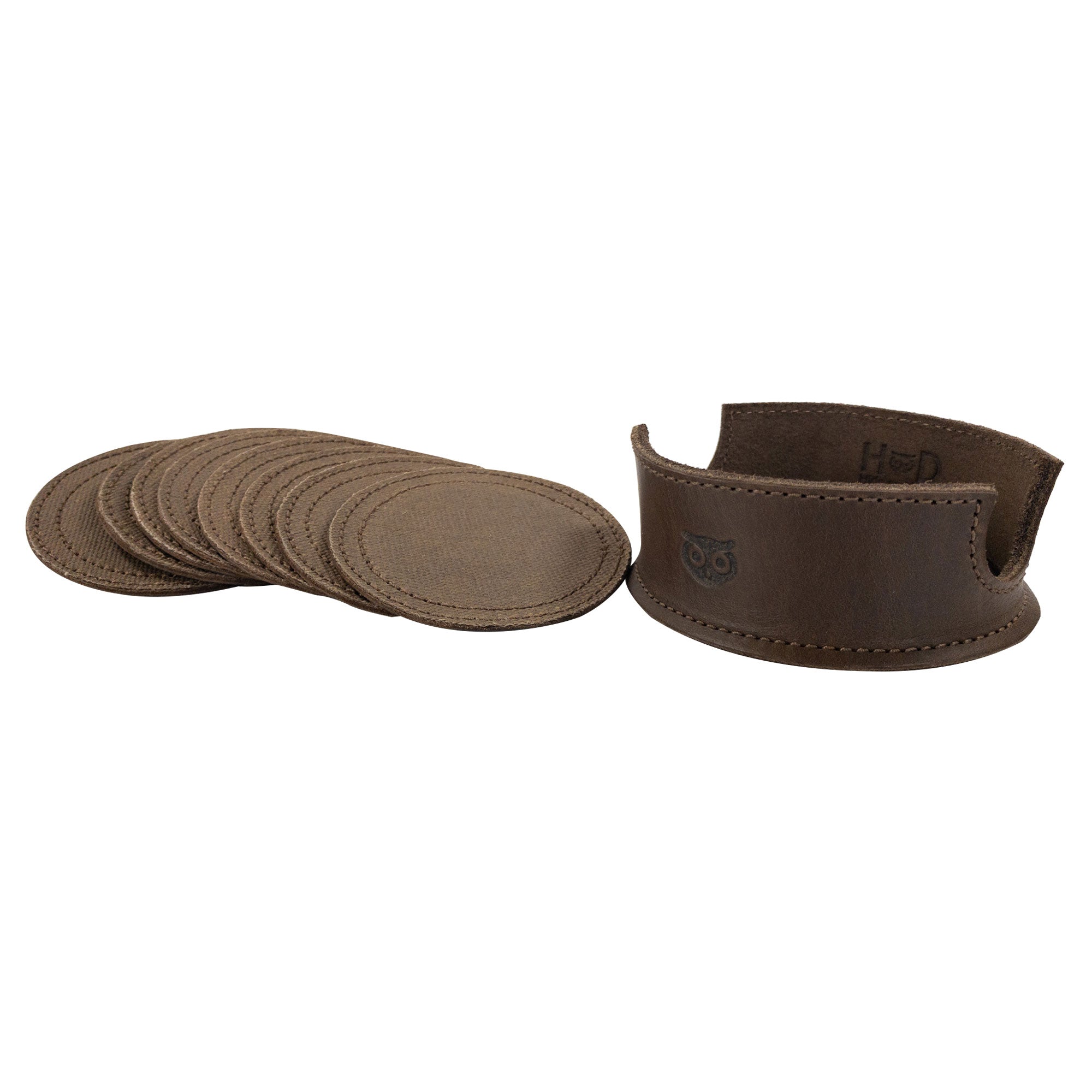 The leather holder and coasters from the Set of 8 Circular Coasters for Drinks by Hide & Drink. This functional set is designed for Glass & Cups Stain Protection and crafted from robust Waxed Canvas and Full Grain Leather. Explore the quality of StockyardX with these pieces that are Small Batch Production, Hand Cut, Hand Sewn, Fire Branded, and made Artisan, Handmade in La Antigua Guatemala & Oaxaca Mexico.