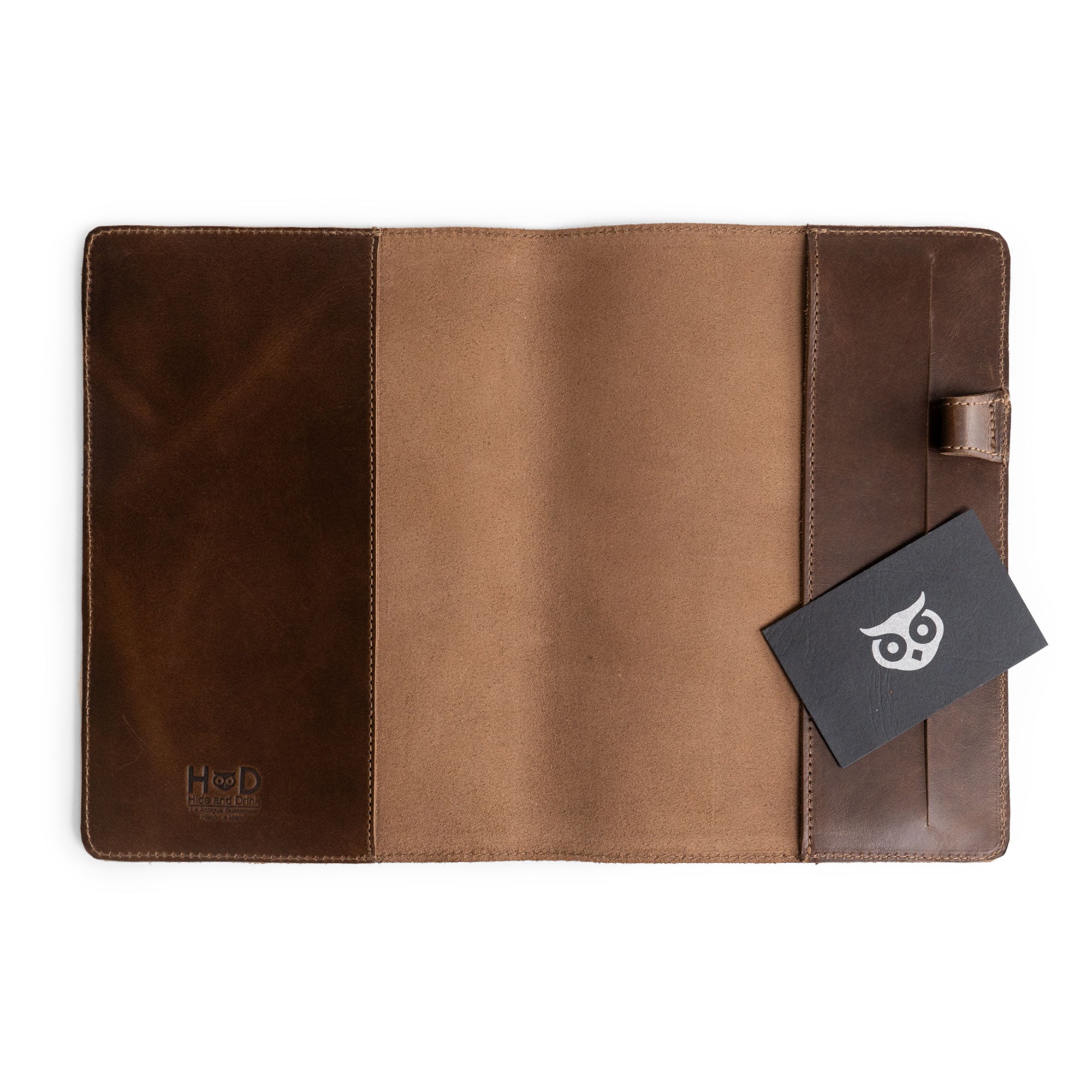 Open view of the Leuchtturm A5 Hardcover Case by Hide & Drink, showing the interior design and a card slot. This Case for Hardcover Leuchtturm A5 (5.75 x 8.25 in.) Notebook provides a secure protective cover for your journal, made from high-quality full grain leather. StockyardX, Small Batch Production, Hand Cut, Hand Sewn, Fire Branded, Artisan, Handmade in La Antigua Guatemala & Oaxaca Mexico.