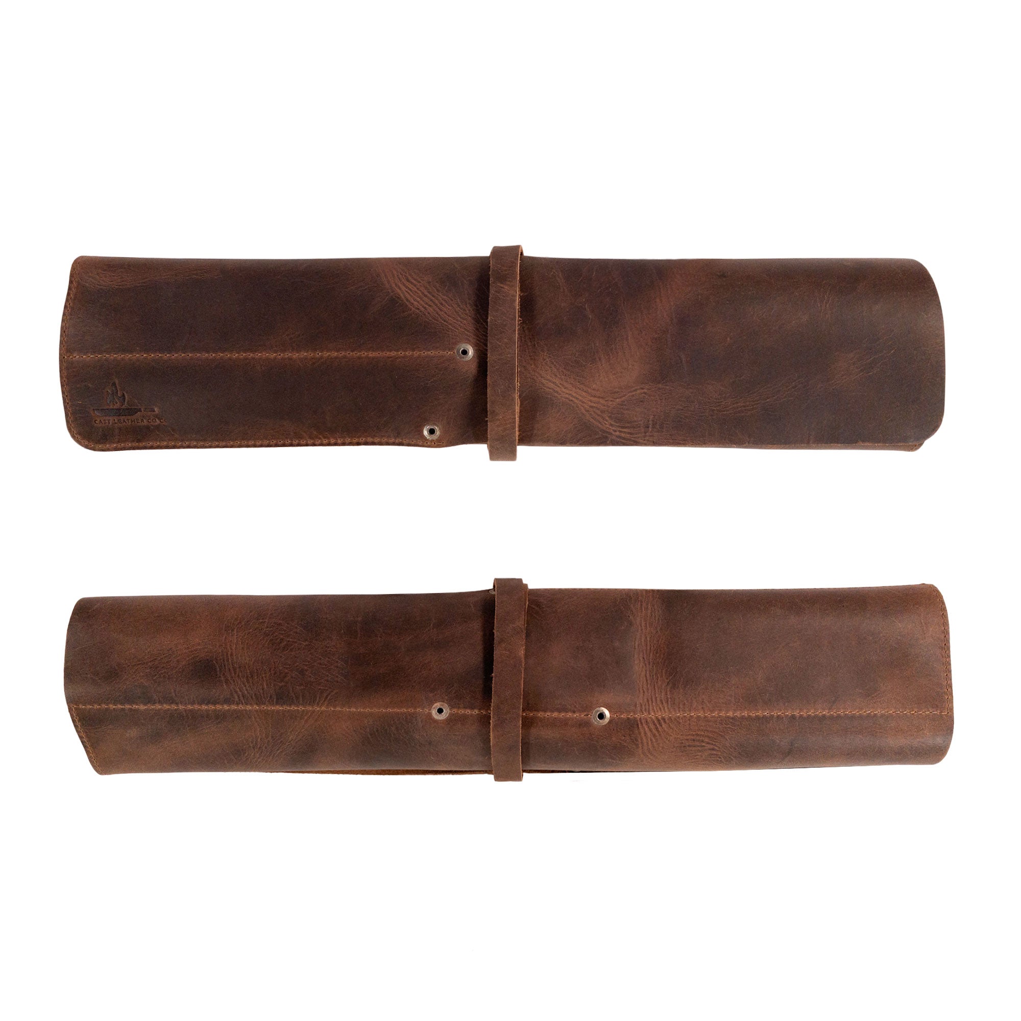Two views of the folded Cast Leather Co. Rectangular Knife Case with 6 Slots, ideal for easy transport. This Rectangular Knife Roll with 6 Slots doubles as a Portable Knife Organizer Case. Made from Full Grain Leather, it’s a stylish cooking accessory. StockyardX’s dedication to small batch production shines through its hand cut and hand sewn details, enhanced by the fire branded design, handmade in La Antigua Guatemala & Oaxaca Mexico.