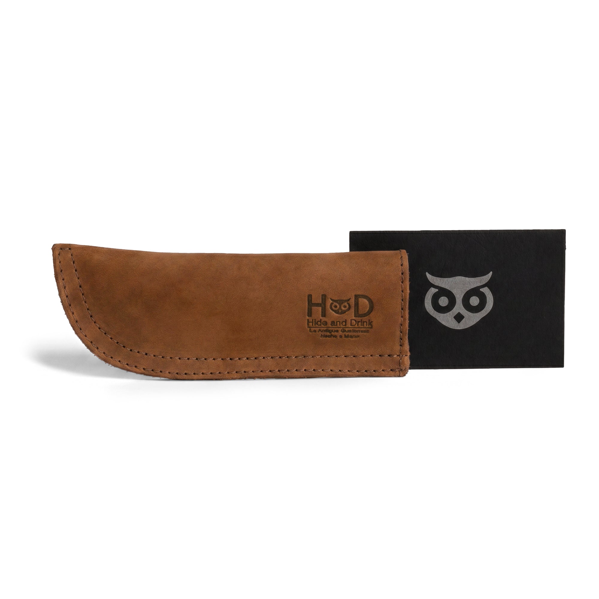 Hide & Drink Cast Iron Panhandle Cover packaged with care. This artisan hot handle protector exemplifies full grain leather quality and artisan craftsmanship. With small batch production in La Antigua Guatemala & Oaxaca Mexico, it's a stylish yet practical kitchen accessory.