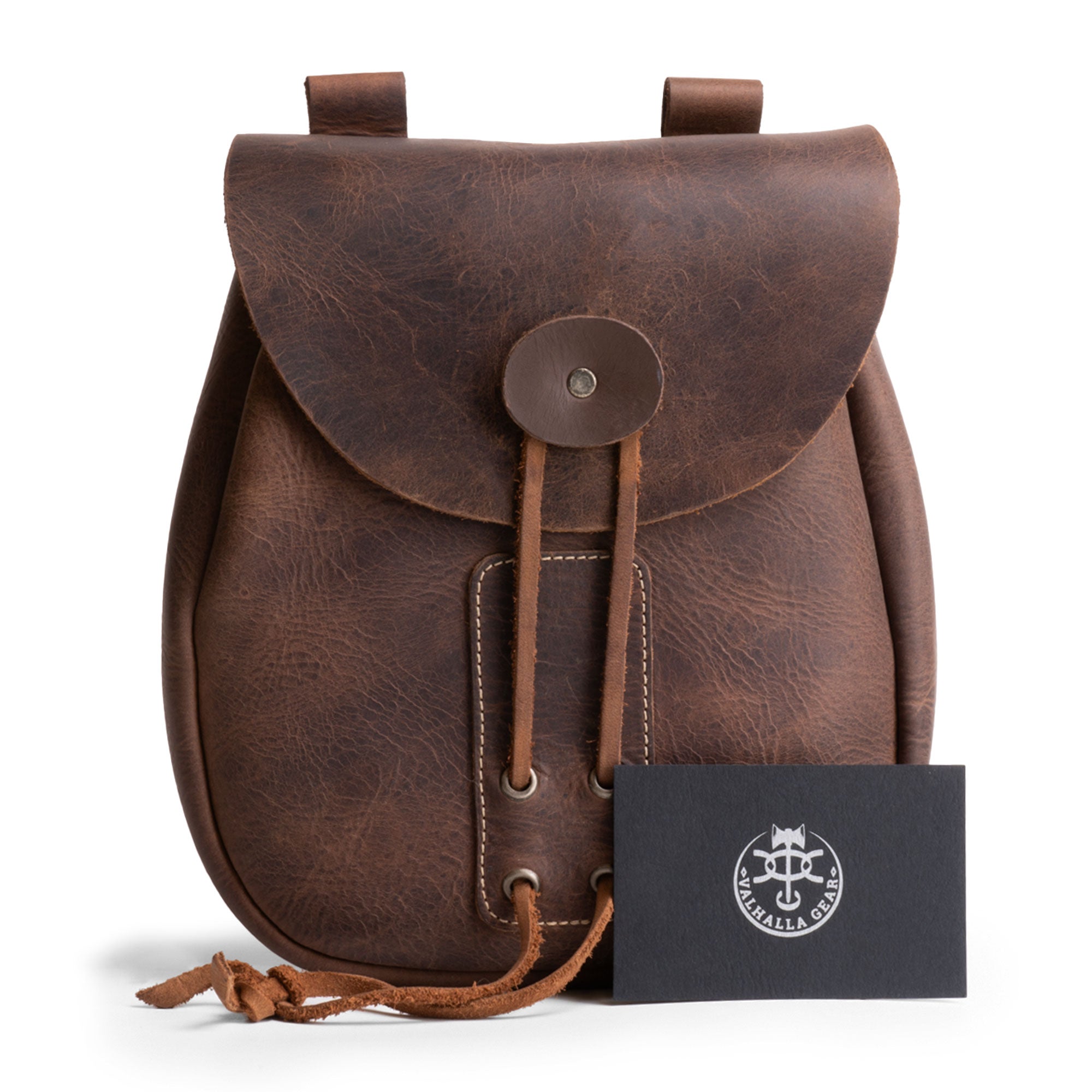 Valhalla Gear Bushcraft Bag with an authenticity card, showcasing its artisan quality as a portable safe pouch made of full grain leather. This handmade bag is ideal for securely storing valuables.