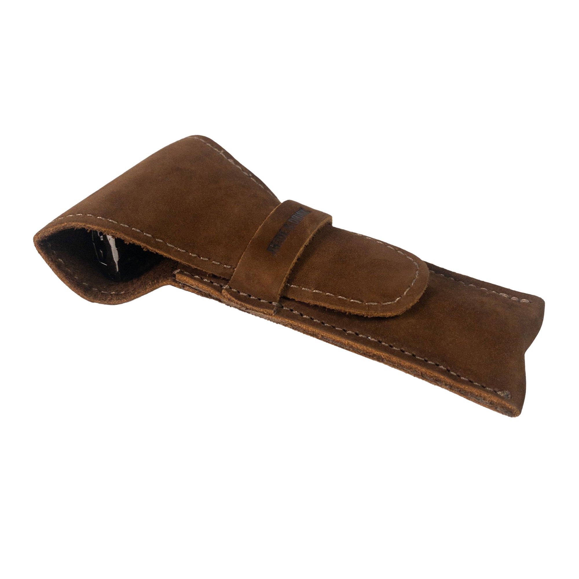 Safety Razor Case from Hide & Drink shown with razor, showcasing its practical design and quality Full Grain Leather materials. This artisan-made accessory is perfect for anyone interested in personal care and grooming.
