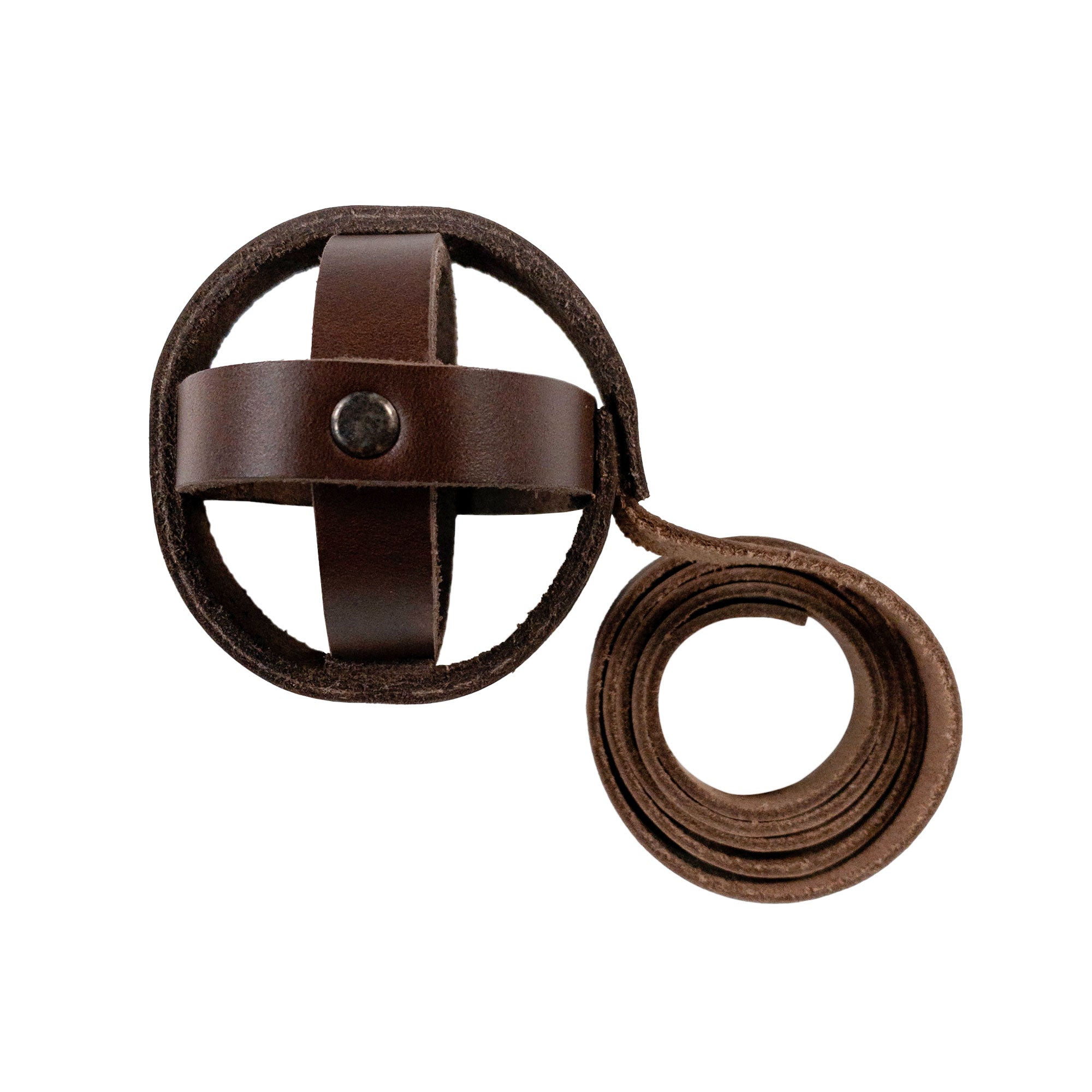 The slender strap of Taco Dog's Ball Toy with Strap for Cats, highlighting the ball's construction. This interactive ball toy, crafted from full grain leather, is designed for indoor play, promoting activity and engagement for your feline friends, handmade in Antigua Guatemala.