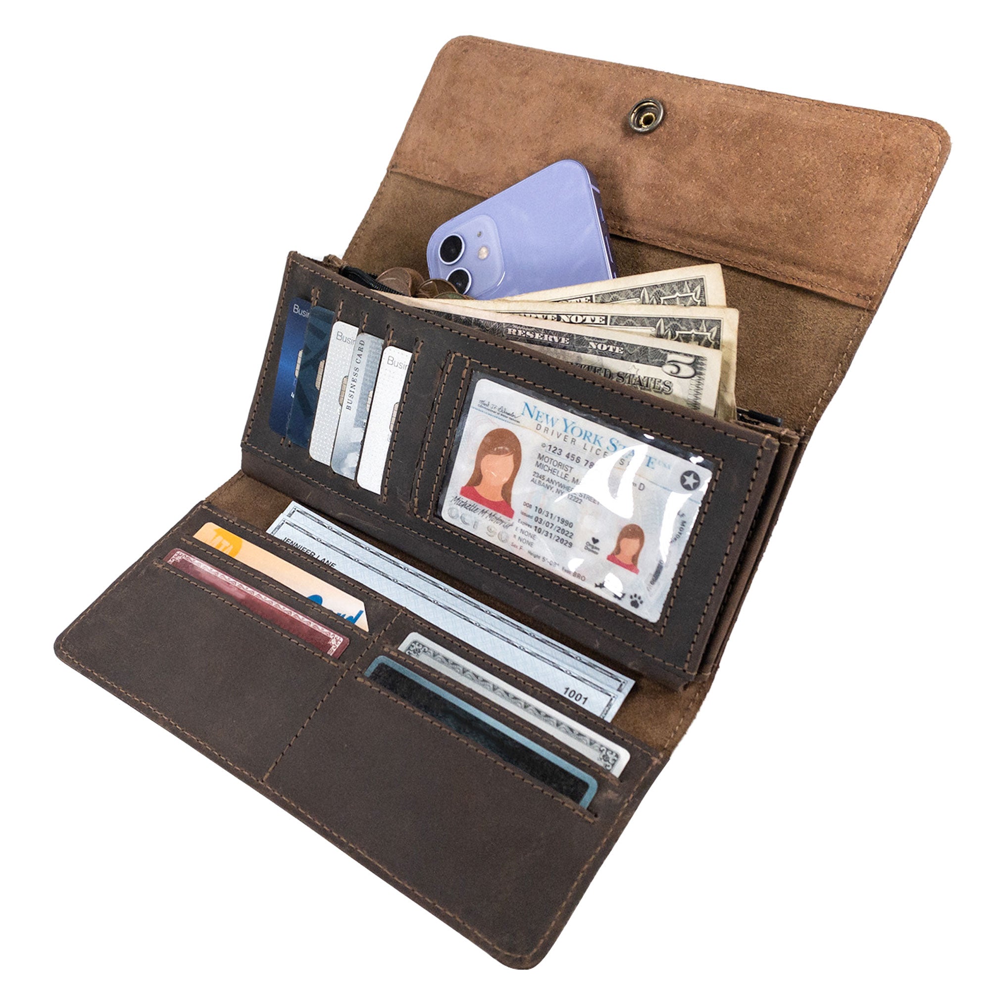 The interior of the Rustic Tri Fold Folio Wallet by Hide & Drink, displaying organized compartments for cards and cash. This Full Grain Leather wallet highlights its functional design as a Minimalist Tri Fold Folio Wallet for Women, featuring artisan craftsmanship through small batch production, hand cut, and hand sewn details, proudly made in La Antigua Guatemala & Oaxaca Mexico.