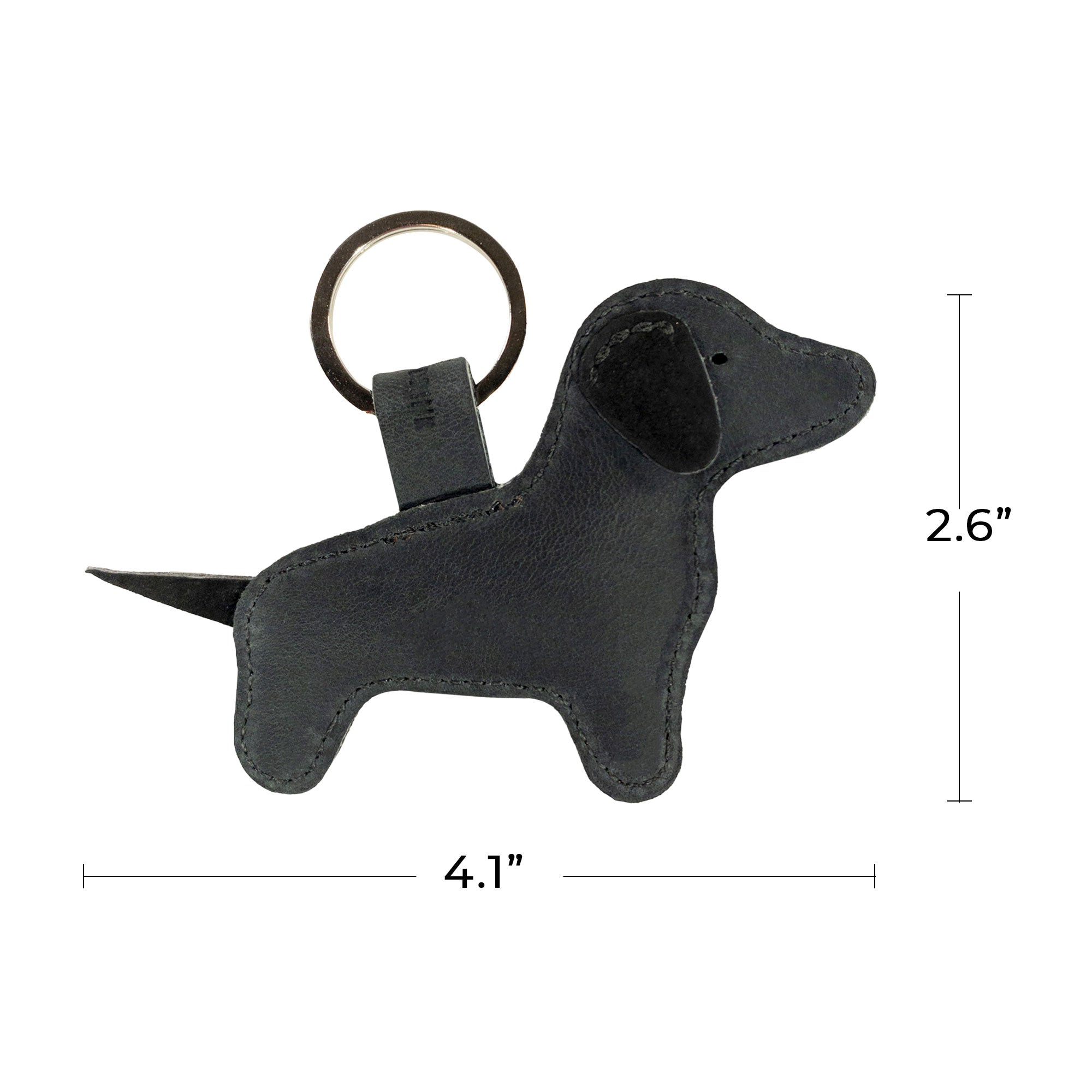 Featuring the Hide & Drink Dog Keychain alongside branding materials, this image illustrates the artisan craftsmanship and attention to detail. Made from premium Full Grain Leather, this cute dog-shaped keyring is a fine example of small batch production, handmade in La Antigua Guatemala & Oaxaca Mexico.