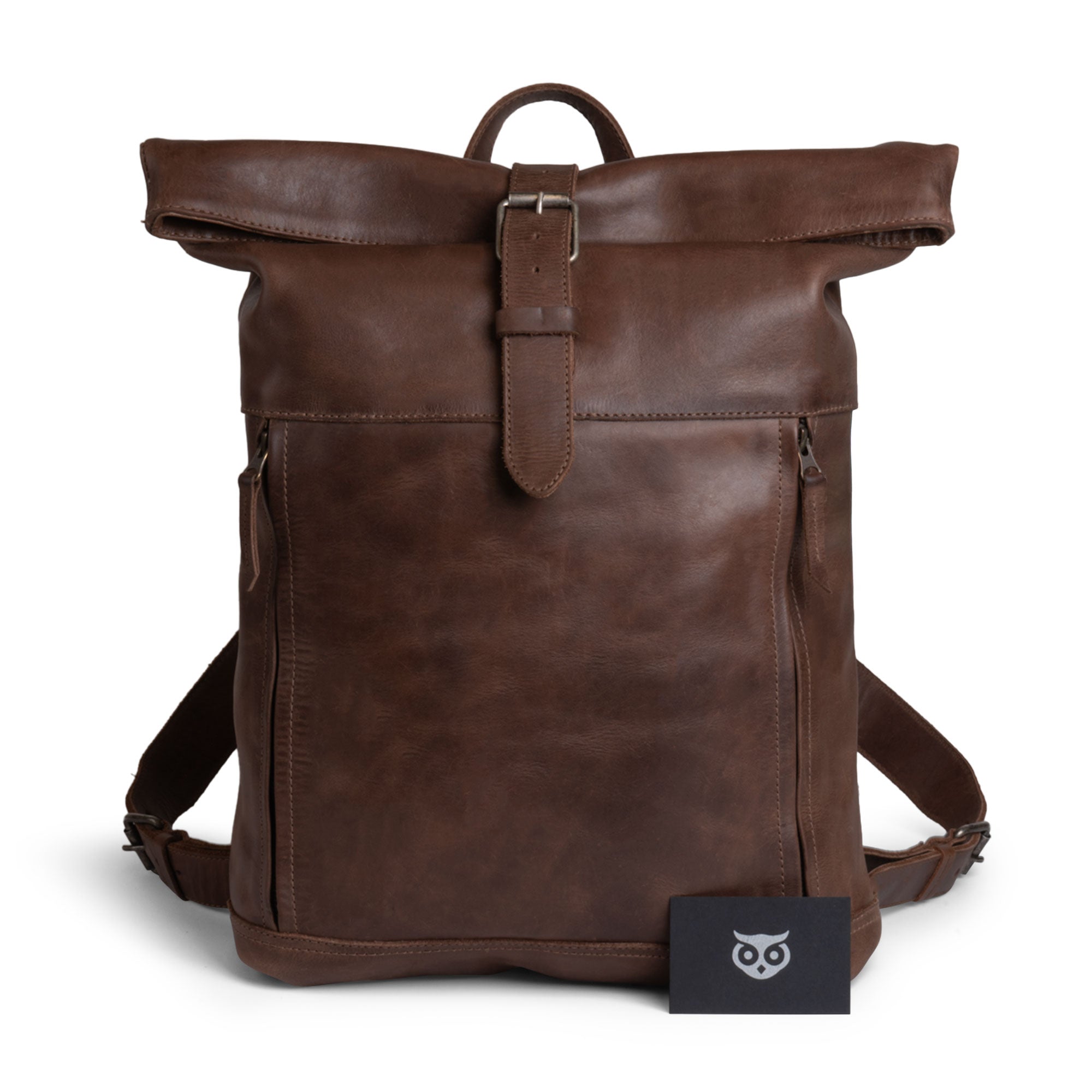 Front view of the Roll Top Backpack by Hide & Drink, highlighting its vintage aesthetics and artisan craftsmanship, perfect for those seeking a durable, stylish rucksack made in La Antigua Guatemala.