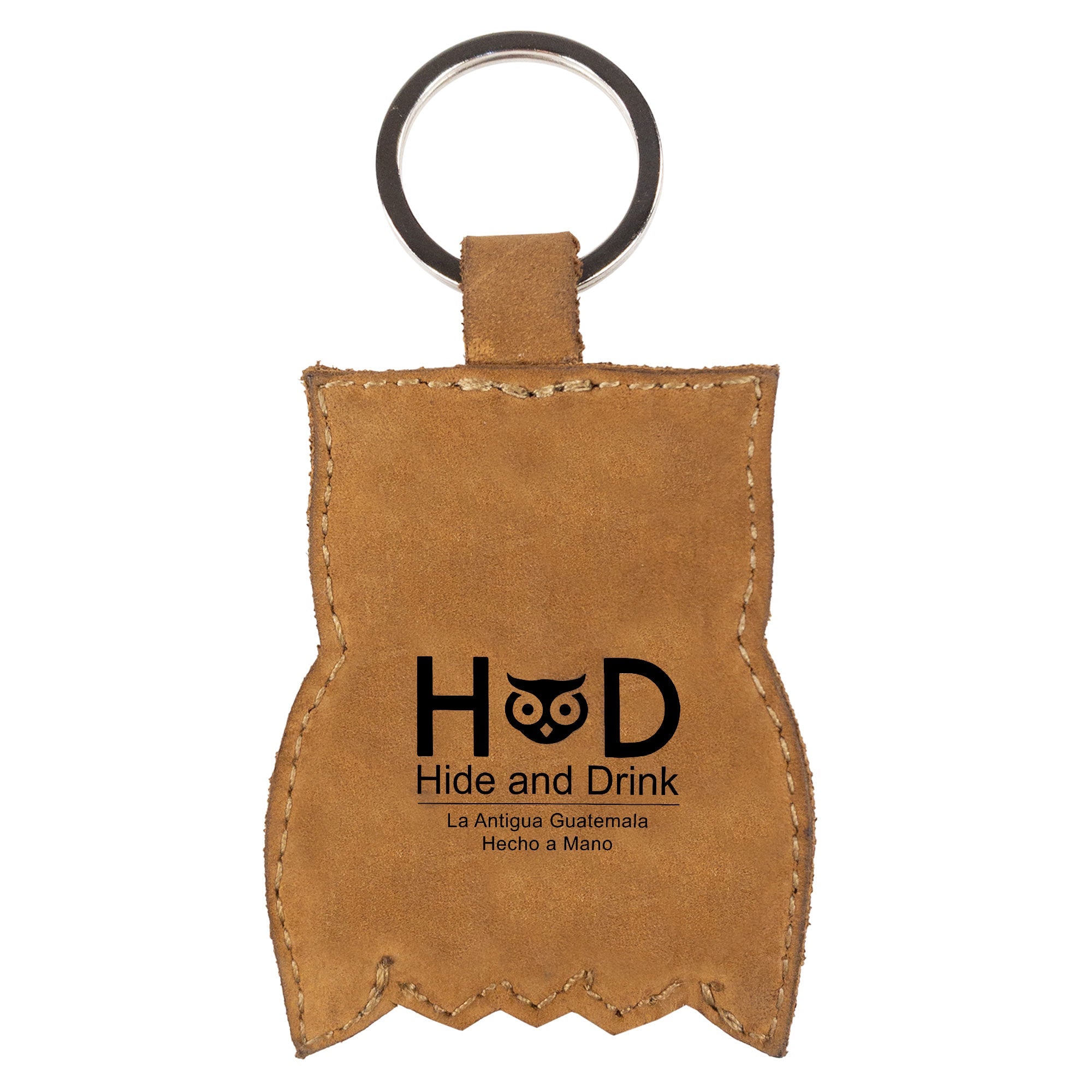 Owl Critter Key Chain from Hide & Drink, paired with its brand identity card, emphasizing its artisanal quality. This delightful Animal Key Ring Holder is made from Full Grain Leather, perfect for keeping keys organized in style. Handmade in La Antigua Guatemala & Oaxaca Mexico.