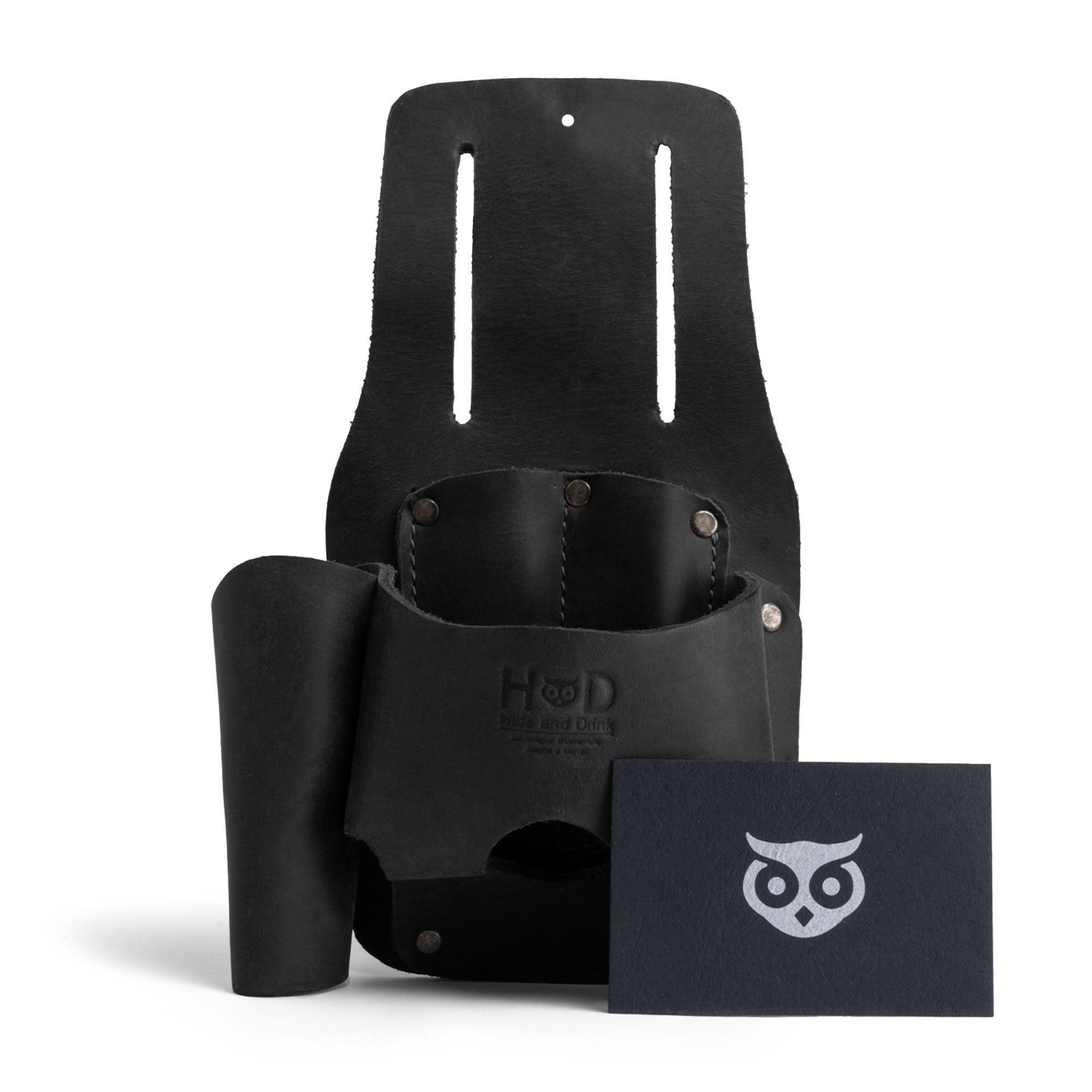 Hide & Drink Tape And Knife Holder in a rich black leather, emphasizing durability and style. This Tape & Knife Holder is a versatile pocket belt pouch perfect for all your tools. Handcrafted in La Antigua Guatemala, it embodies the artisanal quality of small batch production.