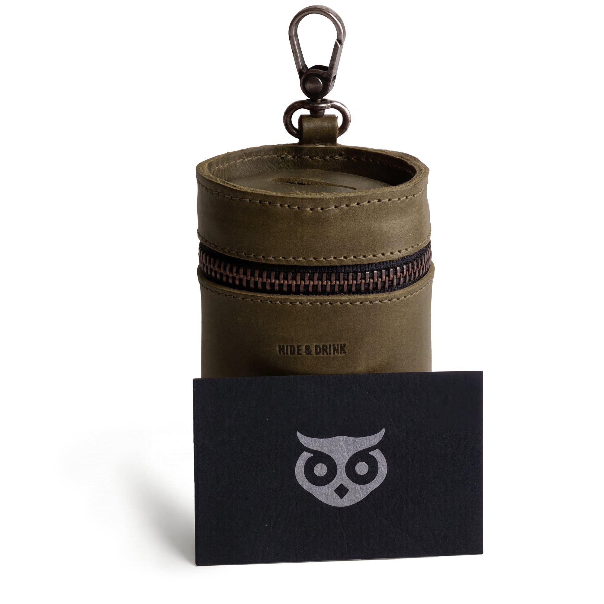 The Bucket Coin Release by Hide & Drink highlights its design alongside a branding card. This full grain leather cash organizer is ideal as a piggy bank bucket and showcases the handmade quality from artisans in La Antigua Guatemala & Oaxaca Mexico.