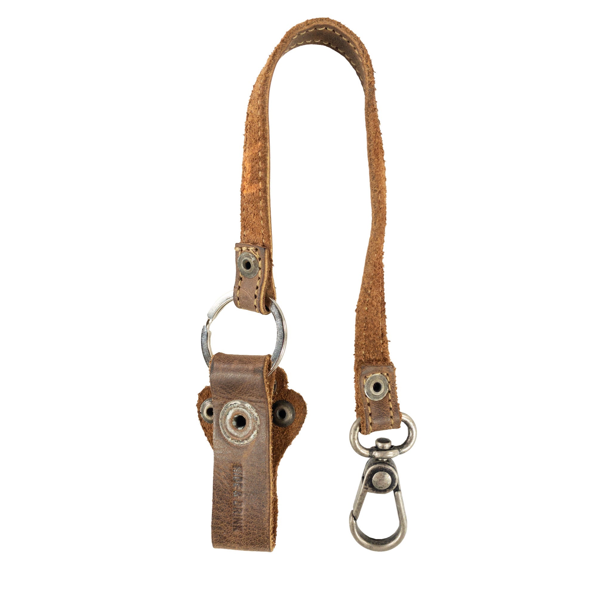 Versatile Paw Lanyard by Hide & Drink showcasing its leather construction. A perfect key holder organizer that fits any style, this Full Grain Leather accessory is great as a gift and represents artisan quality, handmade in La Antigua Guatemala & Oaxaca Mexico.