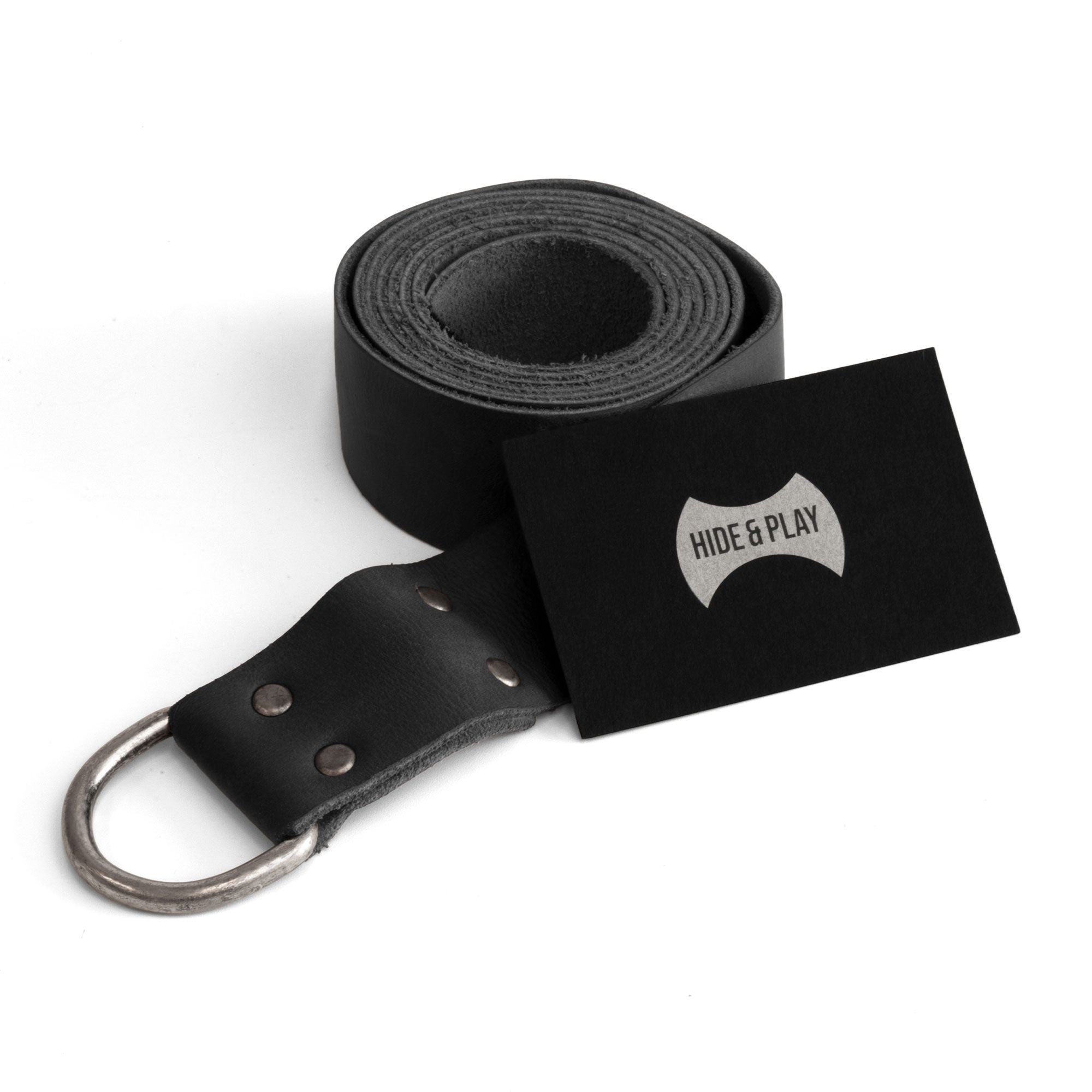Black variant of the Medieval Knight Belt by Hide & Play, elegantly positioned next to a business card, indicating quality and craftsmanship. This Full Grain Leather Medieval Knight Belt for Men serves as a perfect Renaissance Viking Belt for Costume or Cosplay, handmade in La Antigua, Guatemala, showcasing artisan techniques and small batch production.