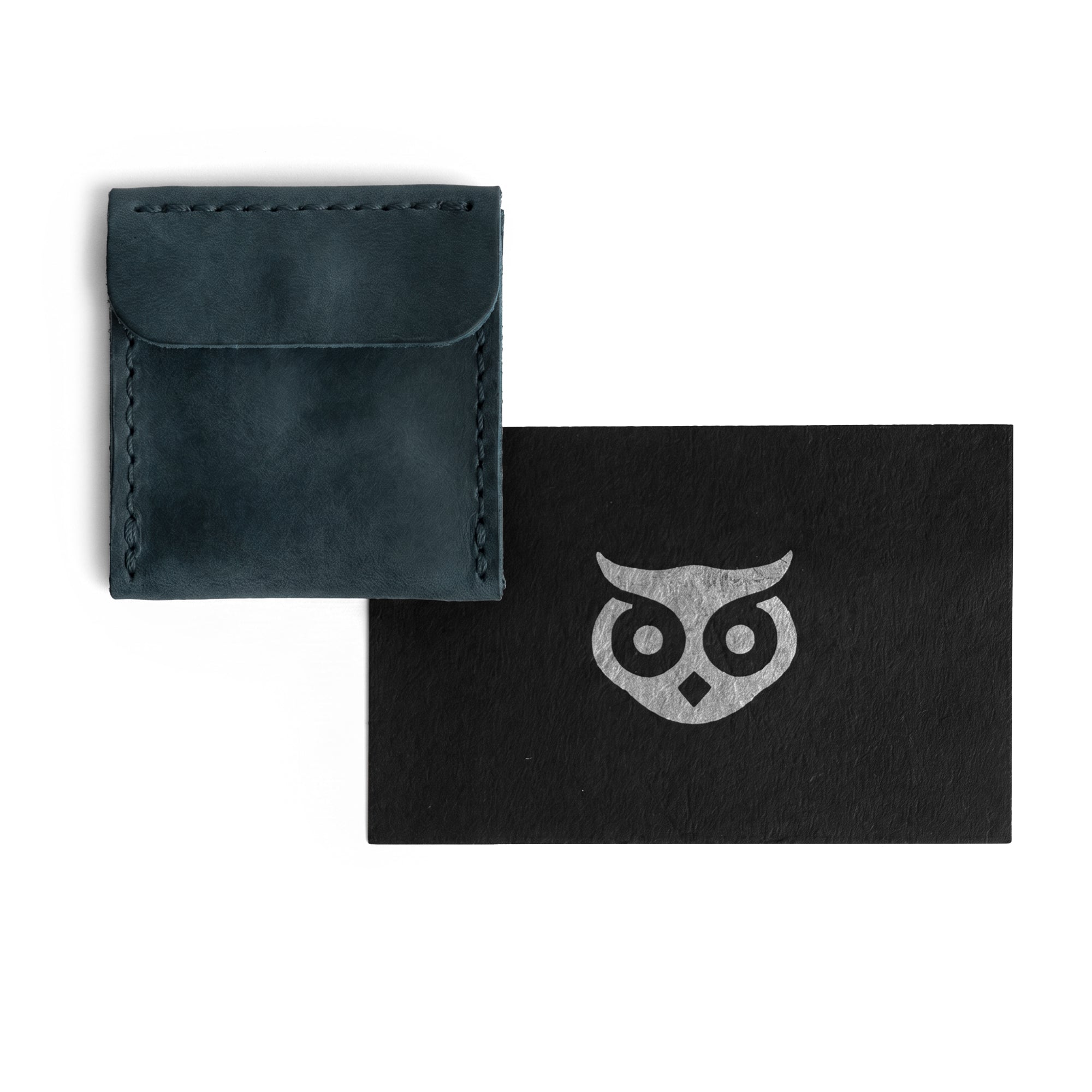 Hide & Drink Wedding Ring Case in blue leather, exhibiting a simple yet elegant design. A perfect travel pouch organizer for jewelry and engagement rings, handmade in La Antigua Guatemala & Oaxaca Mexico with full grain leather.