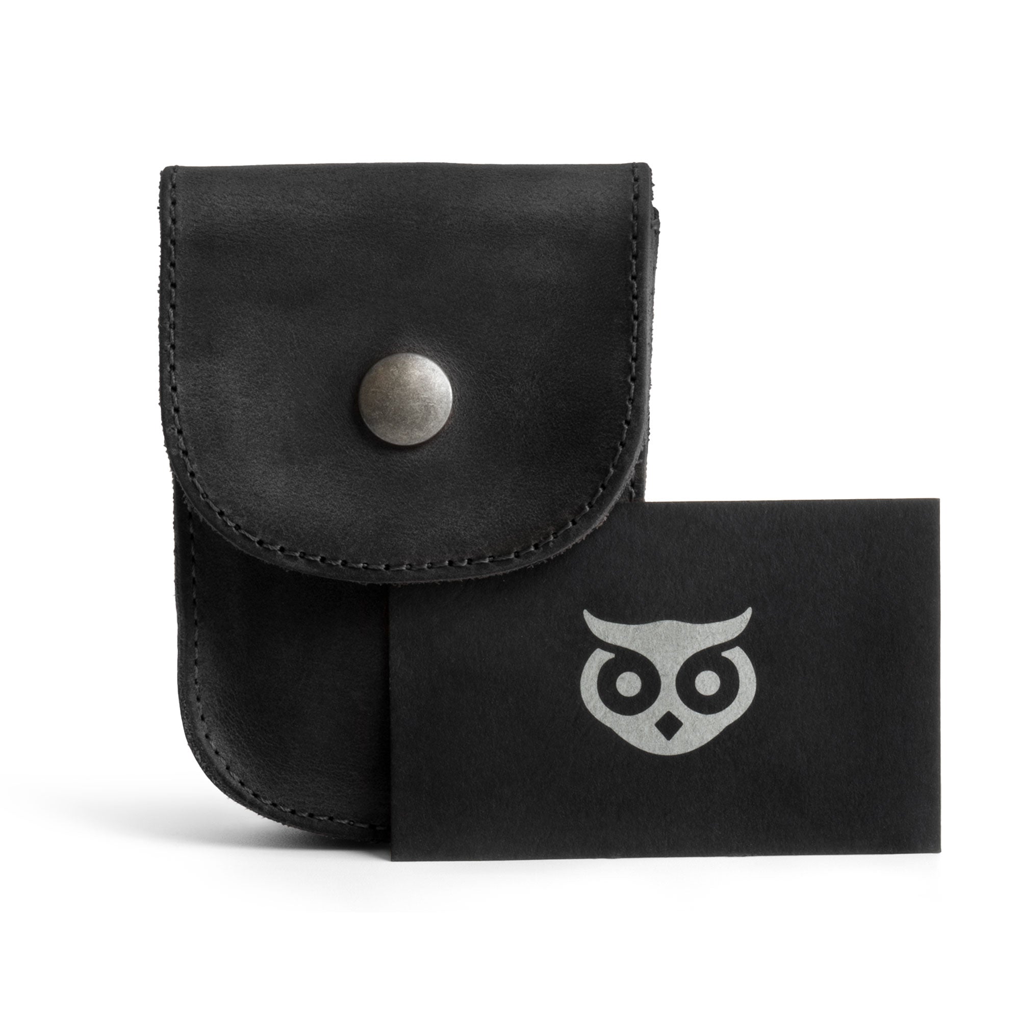 Holster Pouch by Hide & Drink with a brand card, demonstrating its stylish full grain leather craftsmanship. This durable pouch is perfect for organizing coins, cards, and more, crafted in La Antigua Guatemala.