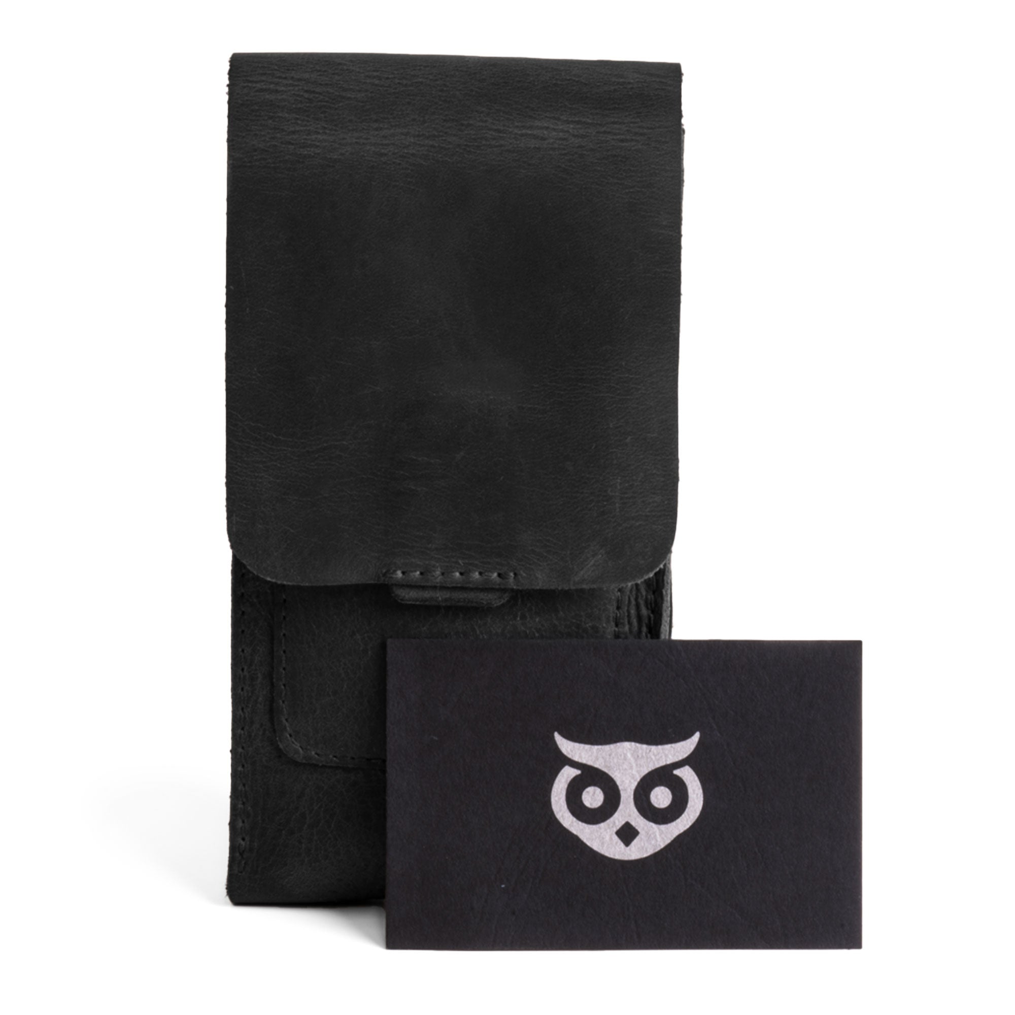 Hide & Drink's black Triple Cigar Holder paired with a branded card, showcasing its artisan craftsmanship. This travel leather cigar case is a great gift for men, made with durable full grain leather and handcrafted in La Antigua Guatemala & Oaxaca Mexico.