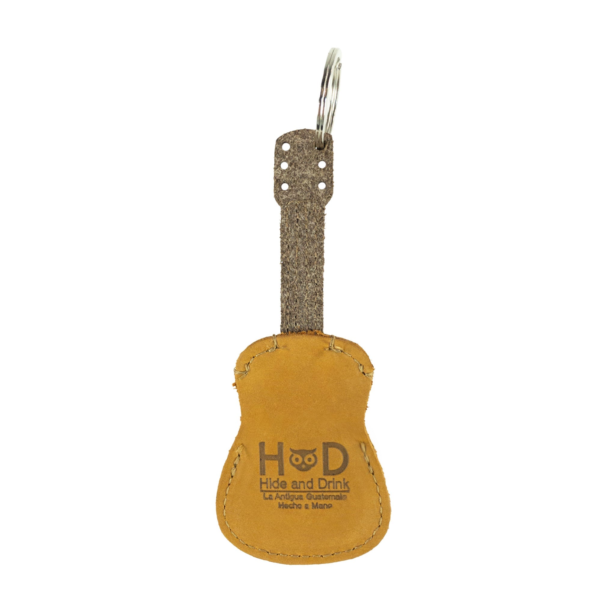 Back view of Hide & Drink Guitar Pick Holder highlighting branding, designed as a Leather Guitar Pick Holder Keychain. Handcrafted from full grain leather, it makes the perfect picks case instrument gift idea for musicians, made in La Antigua Guatemala.