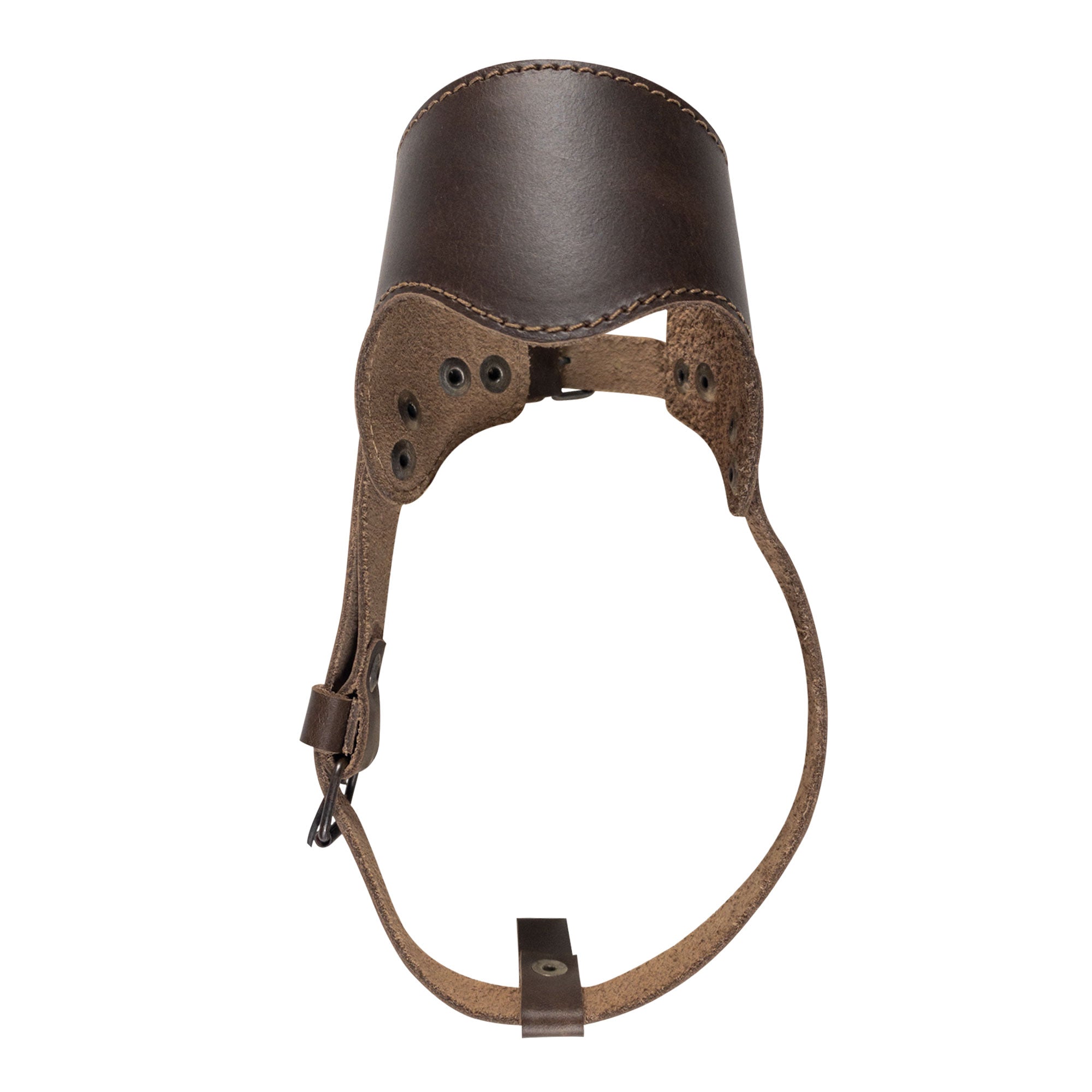 Profile view of the Adjustable Dog Muzzle by Taco Dog, designed to ensure comfort and security for your dog. This stylish muzzle is made from durable full grain leather, hand-cut and sewn by artisans in La Antigua Guatemala.