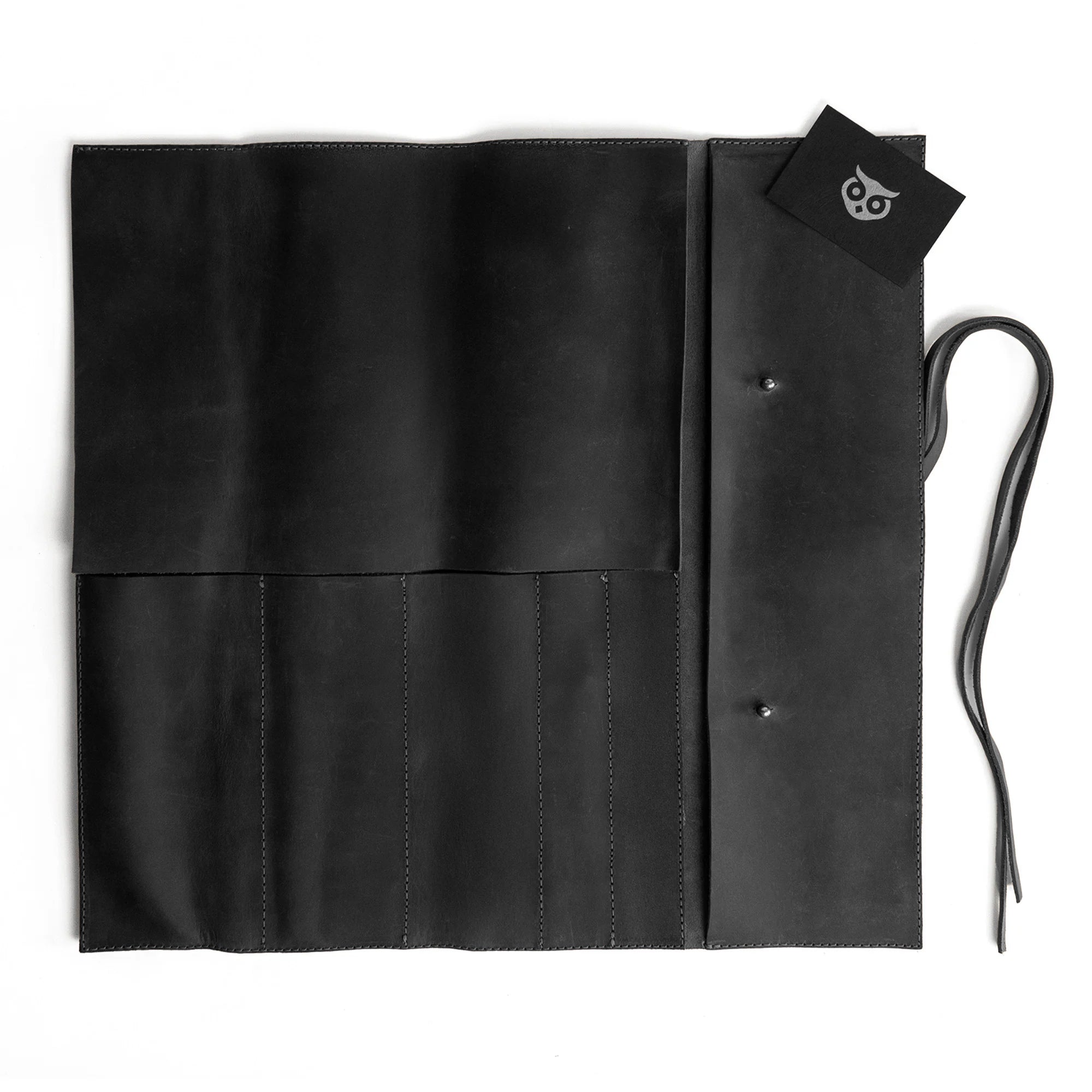 Hide & Drink Knife Roll (5 Pockets) displayed in its entirety, crafted from elegant Full Grain Leather. This Chef Knife Bag serves as a functional portable carrying case for knives, reflecting artisan skills through handmade processes and small batch production techniques.
