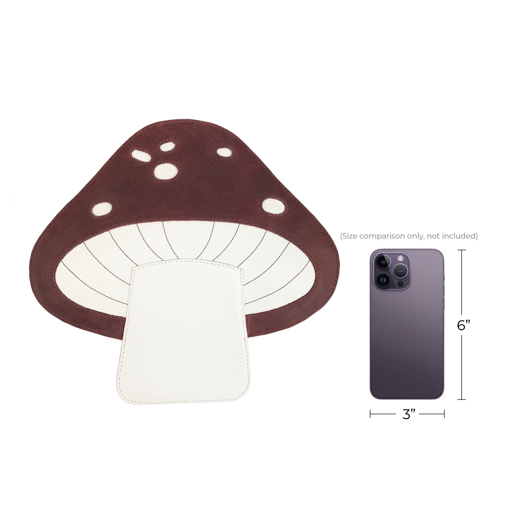 A comparison shot of the Mushroom-Shaped Leather Shoulder Bag by Tudi Frudi with a phone, showing its compact size and stylish design. This bag provides versatility as a crossbody or travel bag, crafted from Full Grain Leather with a focus on small batch artisan production in La Antigua Guatemala.