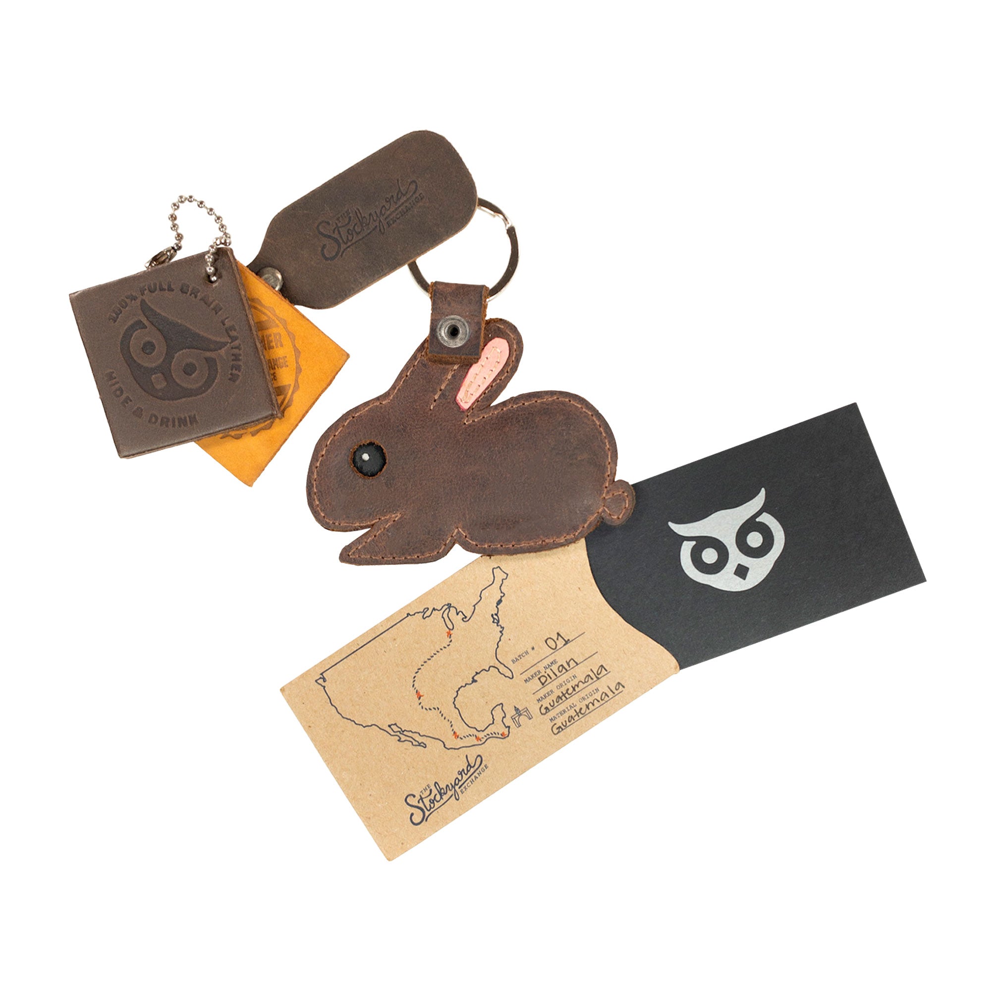 Bunny Critter Key Chain from Hide & Drink, paired with brand identity card, highlighting its handcrafted quality. This fun Animal Key Ring Holder is made from reliable Full Grain Leather and adds charm to any keychain. Handmade in La Antigua Guatemala & Oaxaca Mexico.