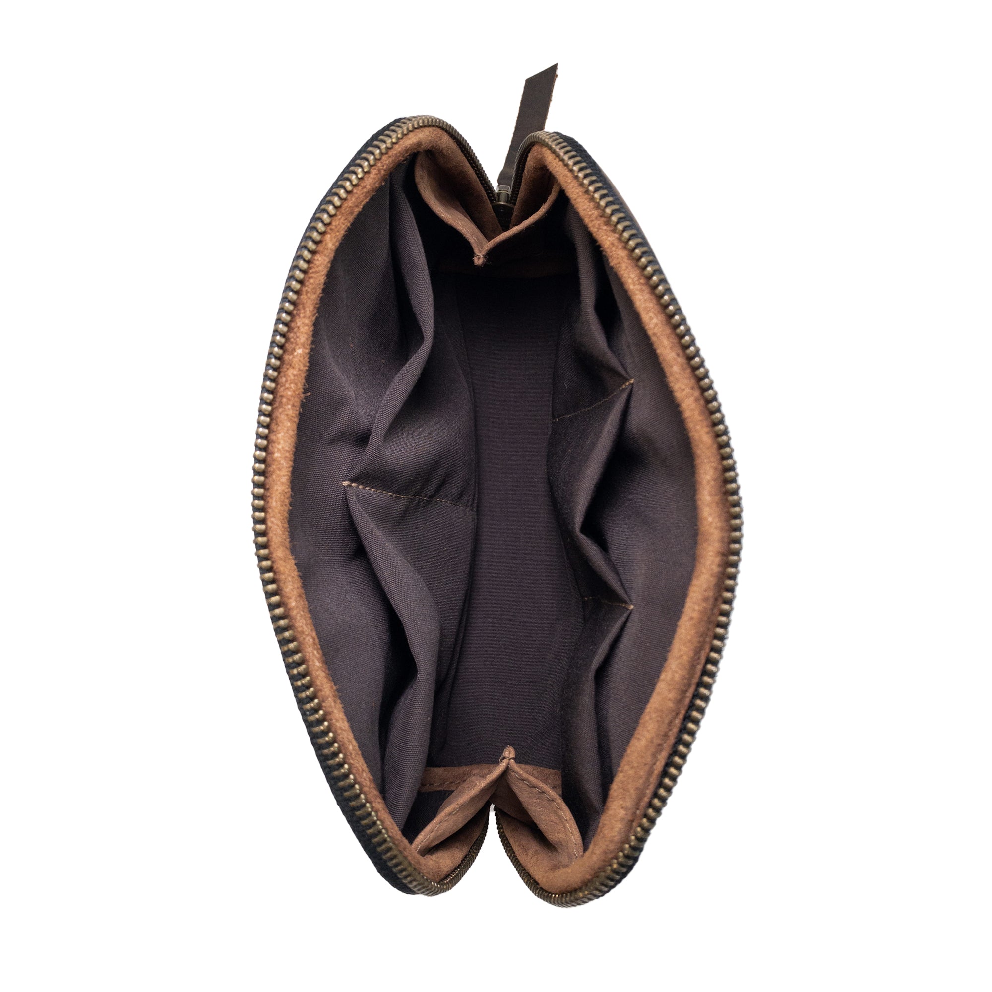 Interior layout of Hide & Drink's Small Tech Organizer, featuring compartments for efficient storage of tech essentials. This zippered leather bag is a great travel accessory, bringing a rustic aesthetic to your tech organization, handcrafted in La Antigua Guatemala & Oaxaca Mexico.