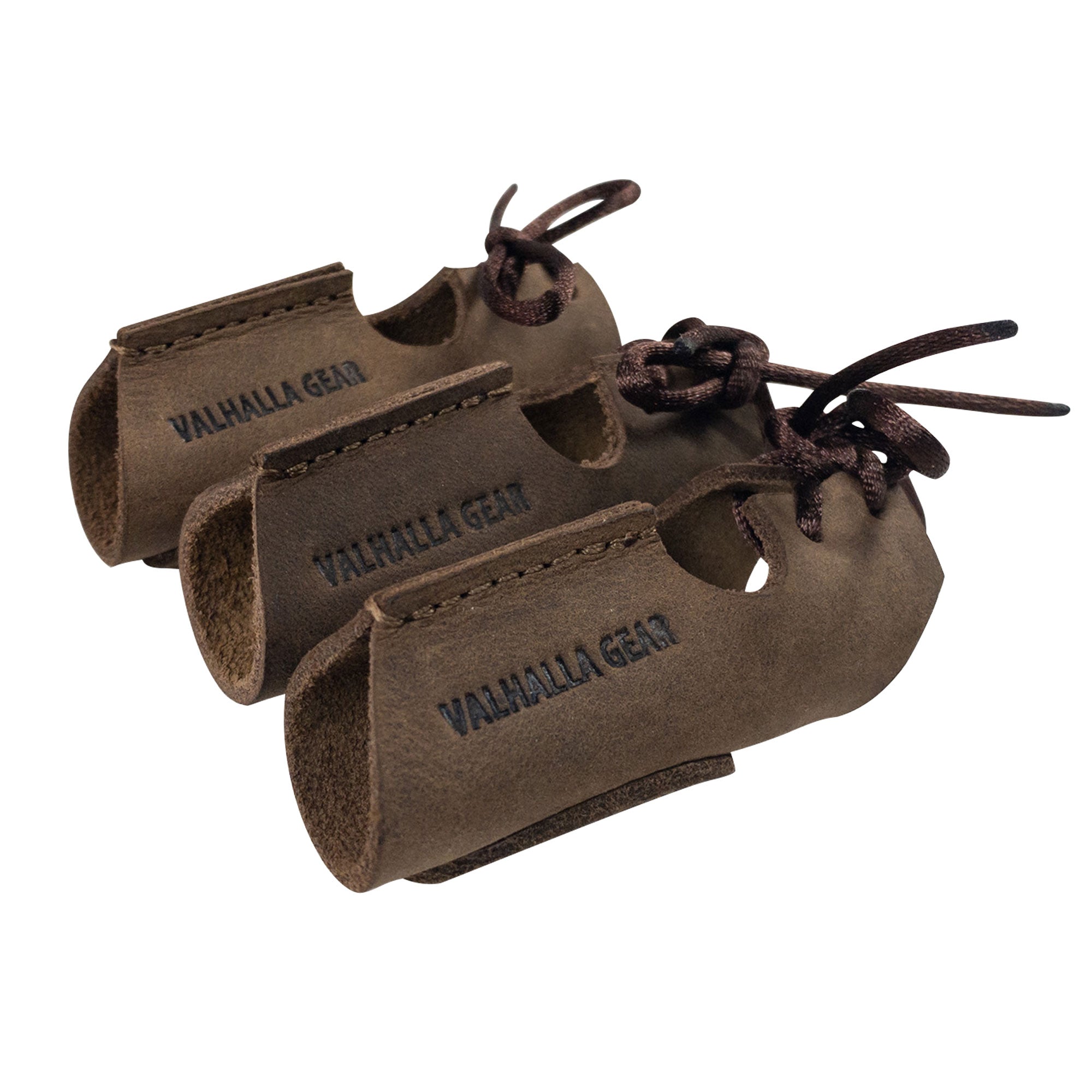 The Set of 3 Finger Protectors for Archery by Valhalla Gear displayed together, highlighting their smooth full grain leather texture. These finger guards are essential archer accessories suitable for recurve bows and shooting targeting. Crafted through small batch production techniques, they are hand cut and hand sewn, featuring artisan quality and fire branding, handmade in La Antigua Guatemala.