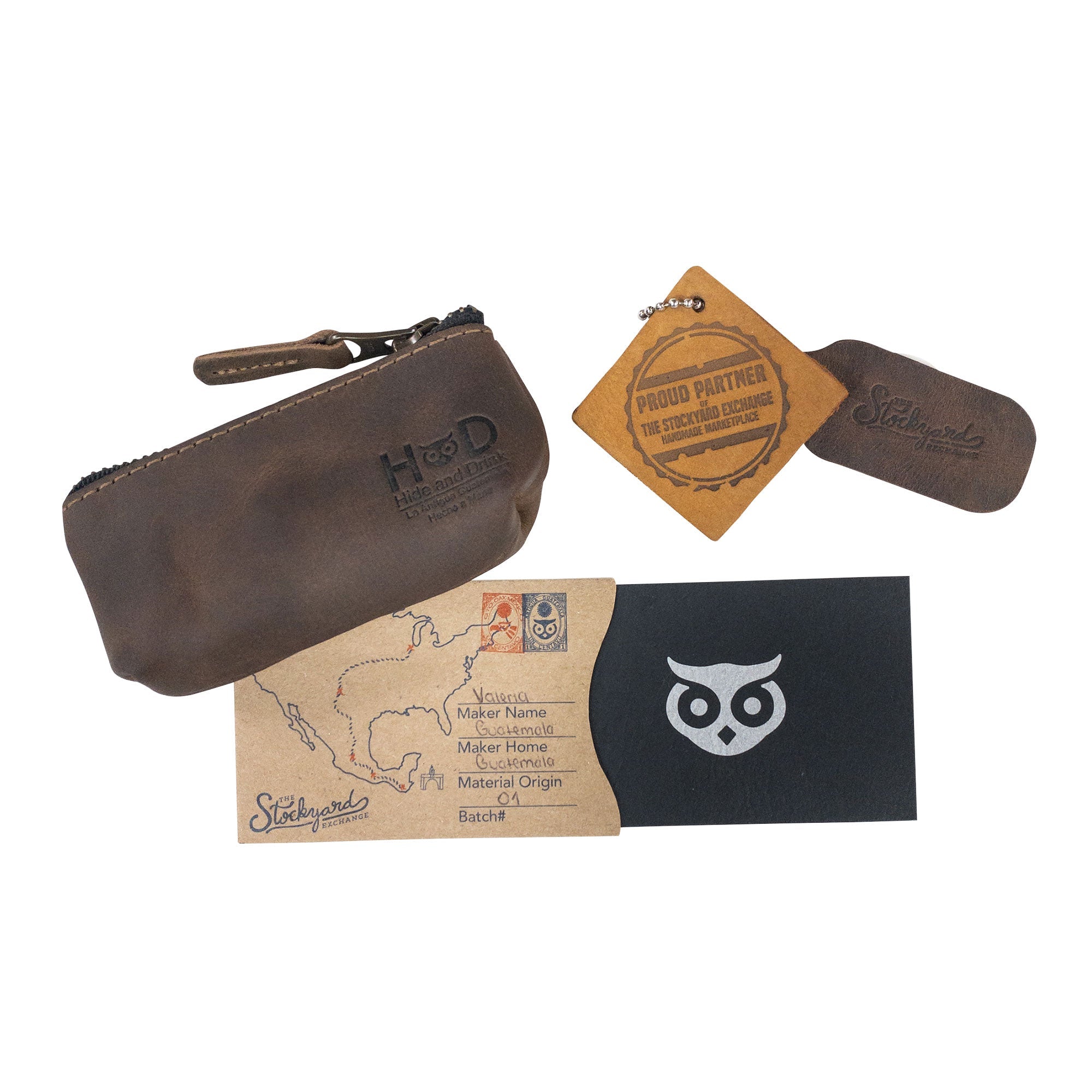 Hide & Drink Key Holder Zippered Pouch with packaging and authenticity tag. Ideal as a zippered coin bag or memory card organizer. Hand cut and sewn vintage style pouch, made in La Antigua Guatemala & Oaxaca Mexico.