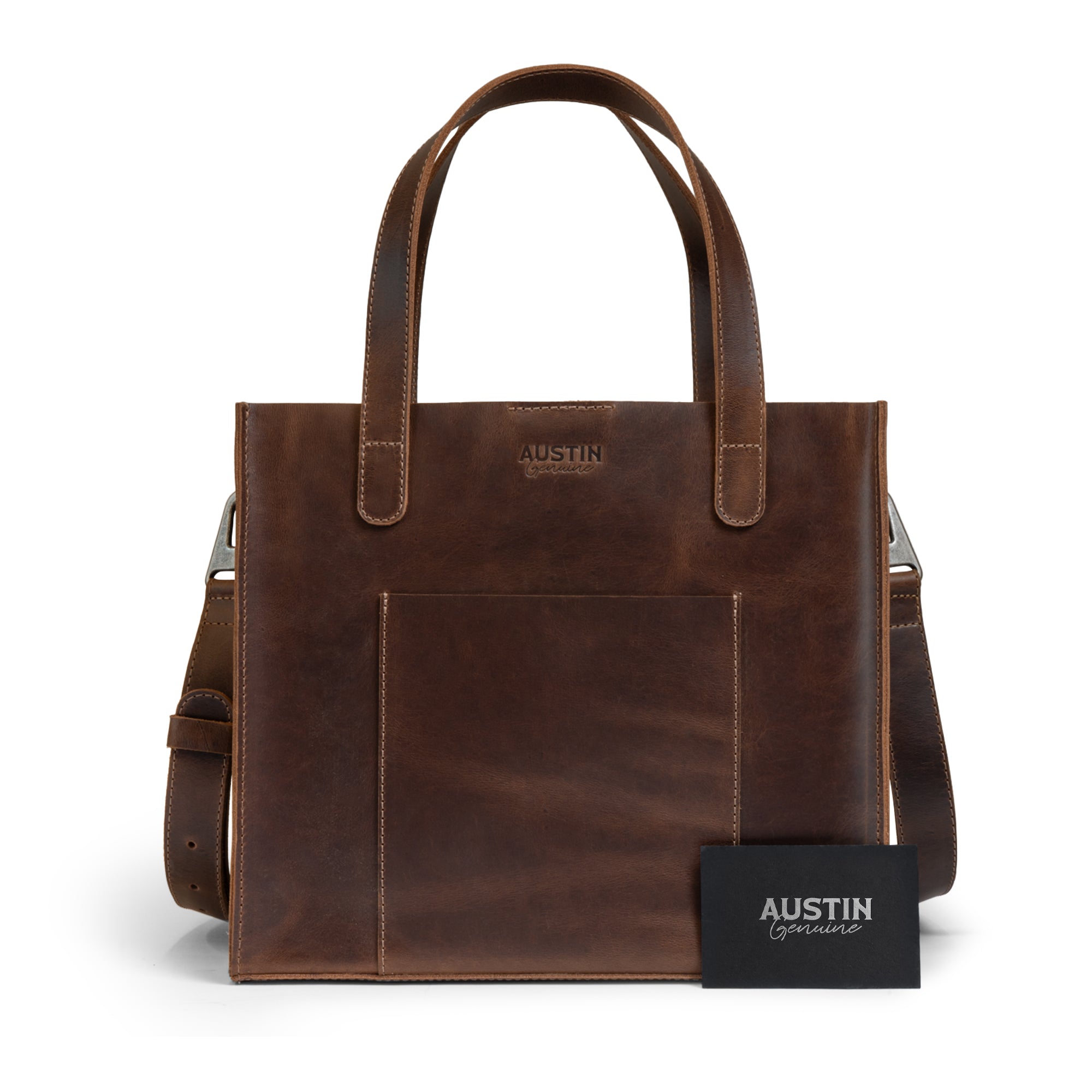The Springdale Crossbody Tote from Austin Genuine alongside a card, showcasing its elegant full grain leather craftsmanship. Hand cut and hand sewn, this artisan bag is a product of small batch production from La Antigua Guatemala & Oaxaca Mexico.