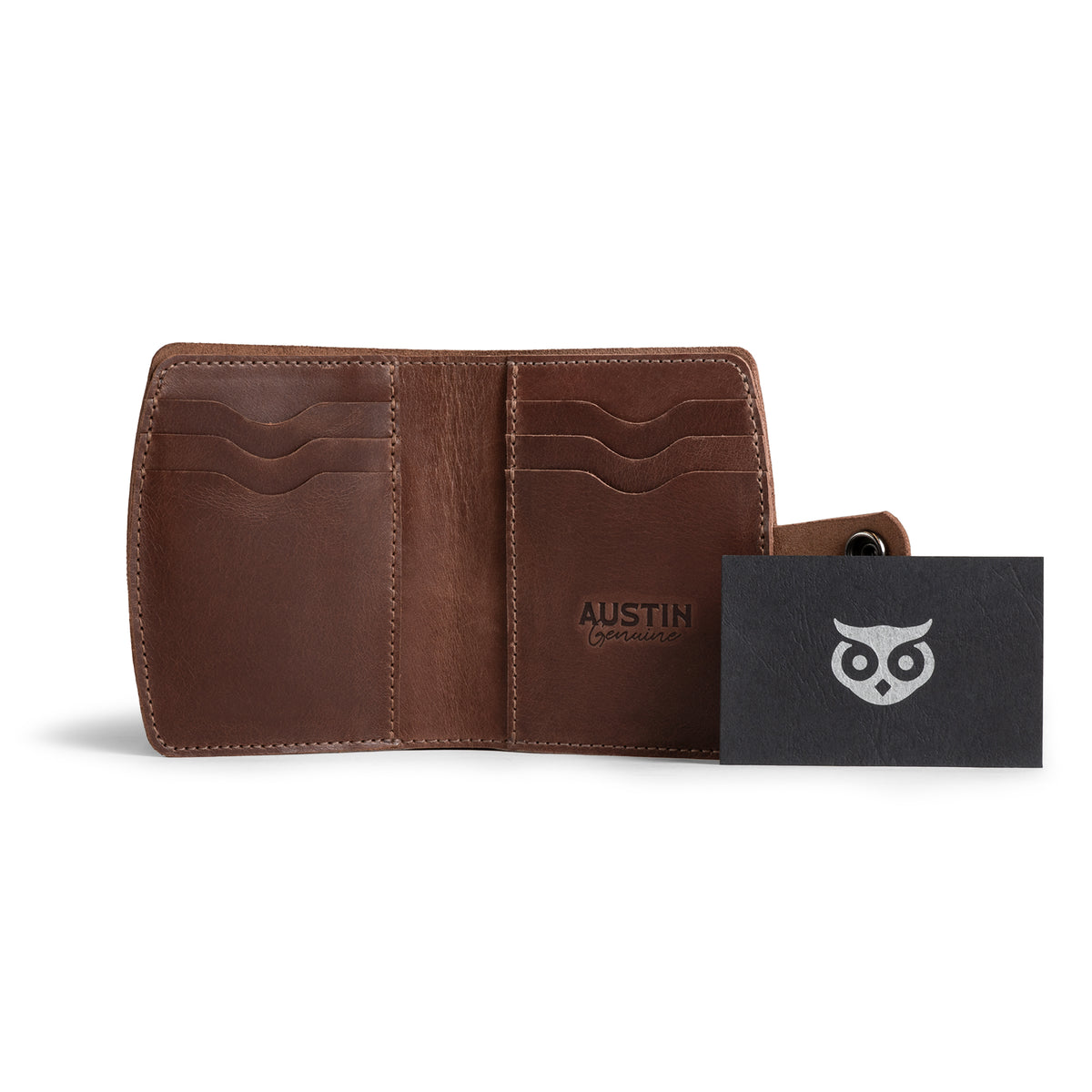 Austin Genuine The Waterloo Bifold Wallet held open in a coffee shop, displaying card storage and compact travel design in Full Grain Leather. StockyardX, Small Batch Production, Hand Cut, Hand Sewn, Fire Branded, Artisan, Handmade in La Antigua Guatemala & Oaxaca Mexico.