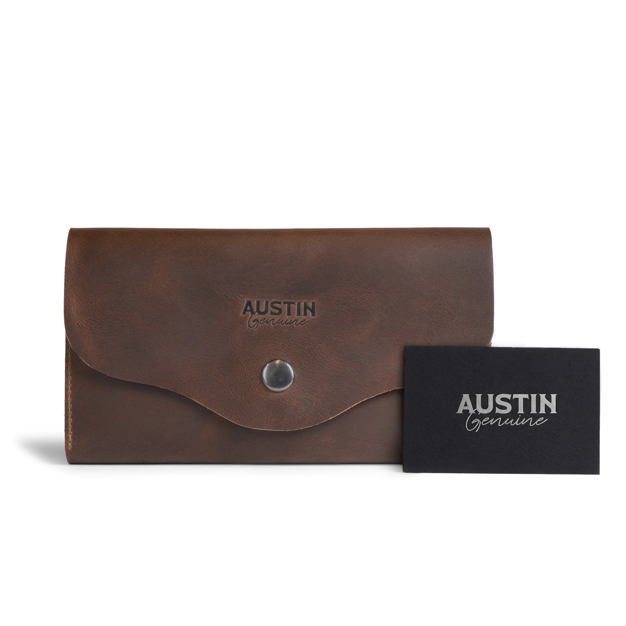 The Violet Long Wallet by Austin Genuine, displayed with a business card to highlight its unique design in full grain leather. This wallet is a product of StockyardX's small batch production, hand cut and hand sewn by artisans in La Antigua Guatemala & Oaxaca Mexico, featuring a distinctive fire branded logo.