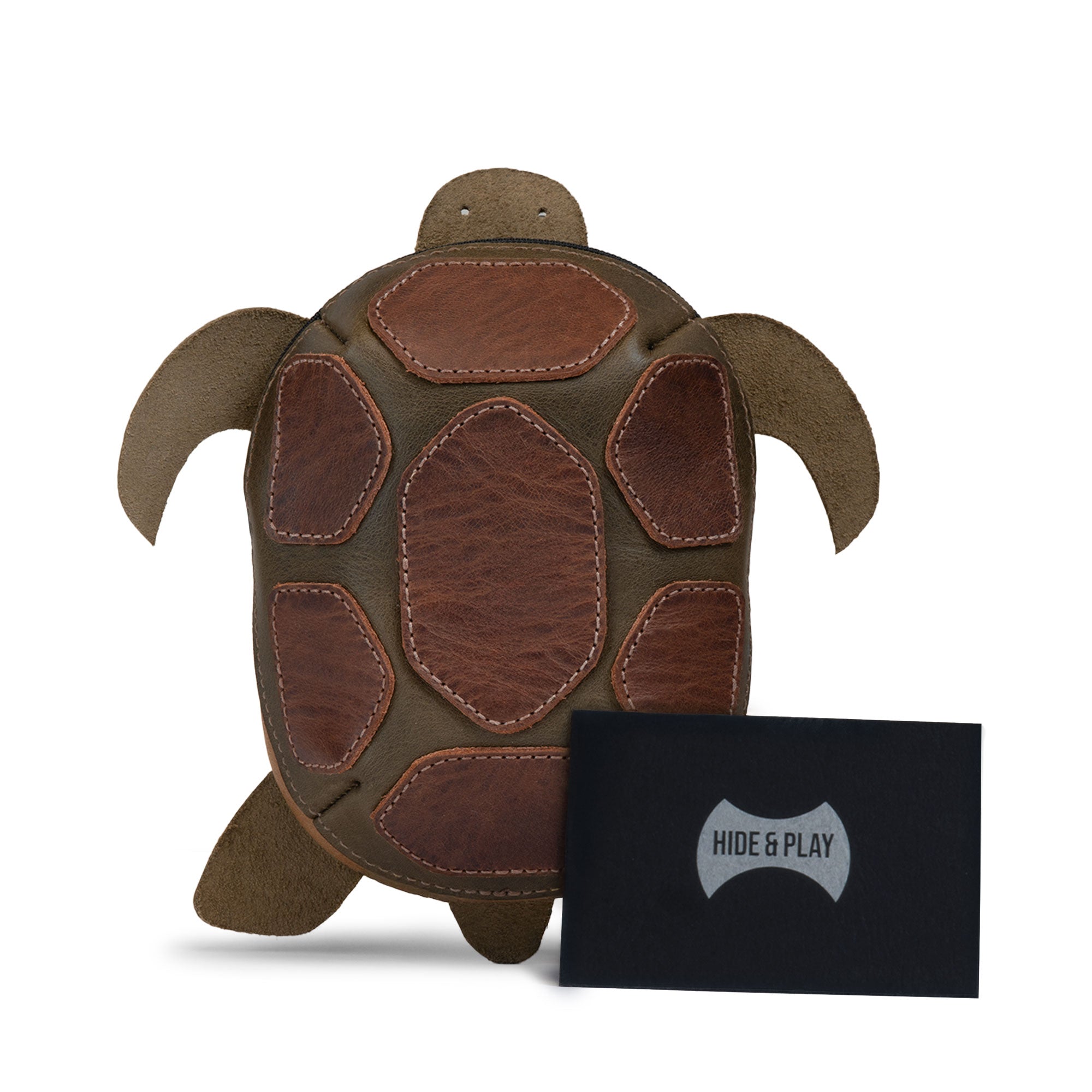 Hide & Play Leather Turtle Pouch front view with brand logo bag, highlighting the hand cut and hand sewn full grain leather turtle-shaped coin pouch, tortoise-shaped leather coin purse change bag and purses & pouches for cash; also functions as a zippered cable case / small charger cable holder for a tiny travel carrier—small batch production, fire branded artisan, handmade in La Antigua Guatemala & Oaxaca Mexico (StockyardX).