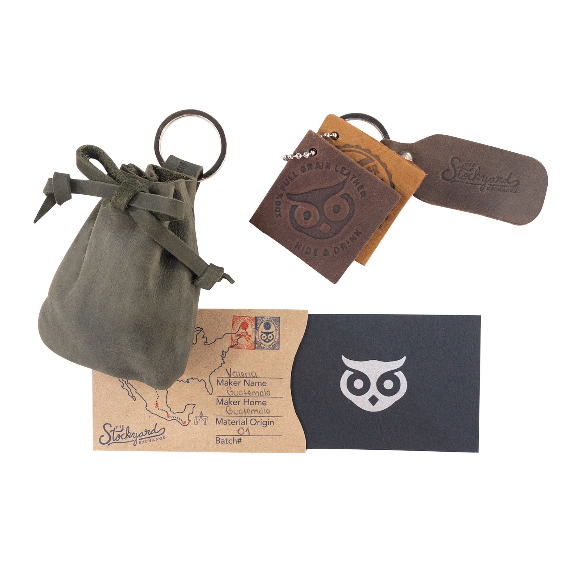 A captivating view of the Mini Medieval Pouch Keychain by Hide & Drink filled with coins, showing its practicality. This tiny bag with keyring is made from full grain leather, emphasizing artisan craftsmanship from La Antigua Guatemala.