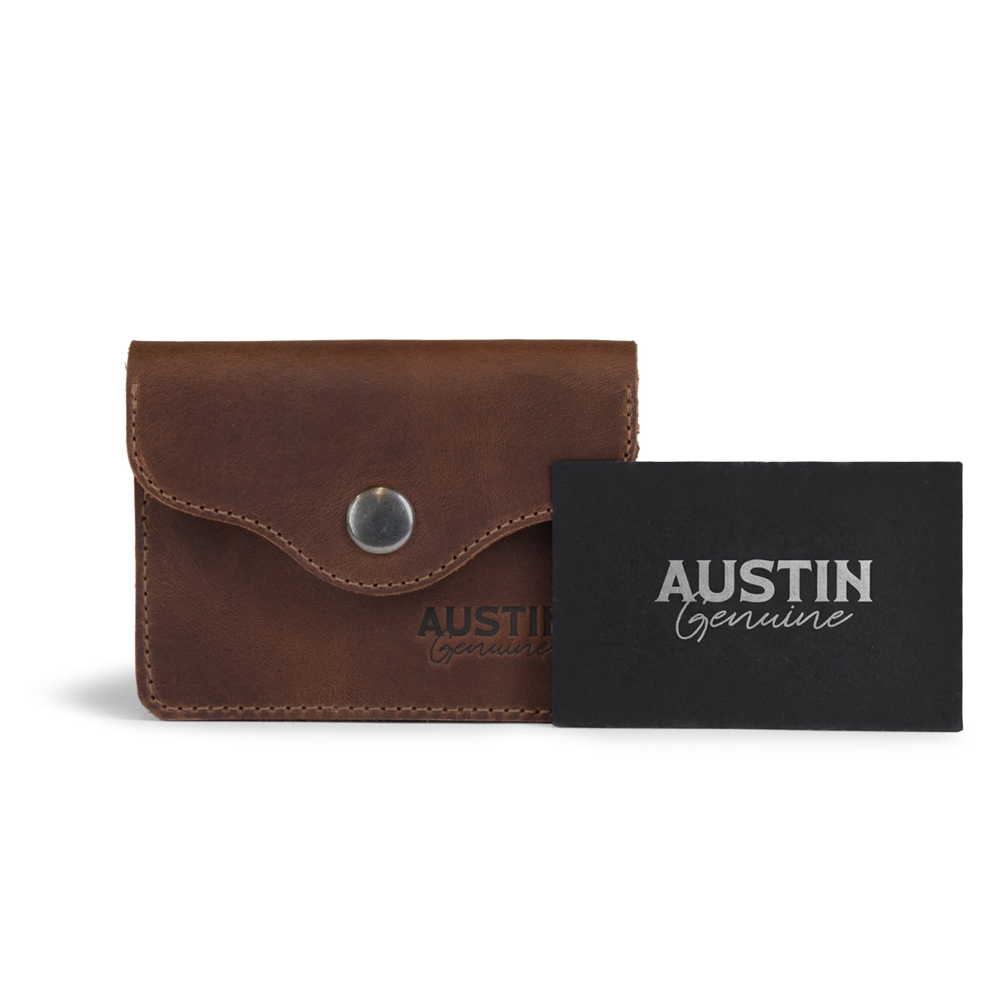 The Hyde Card Wallet by Austin Genuine displayed with its branding card, crafted from premium full grain leather, illustrating the exquisite artisan craftsmanship and fire branded logo associated with small batch production.