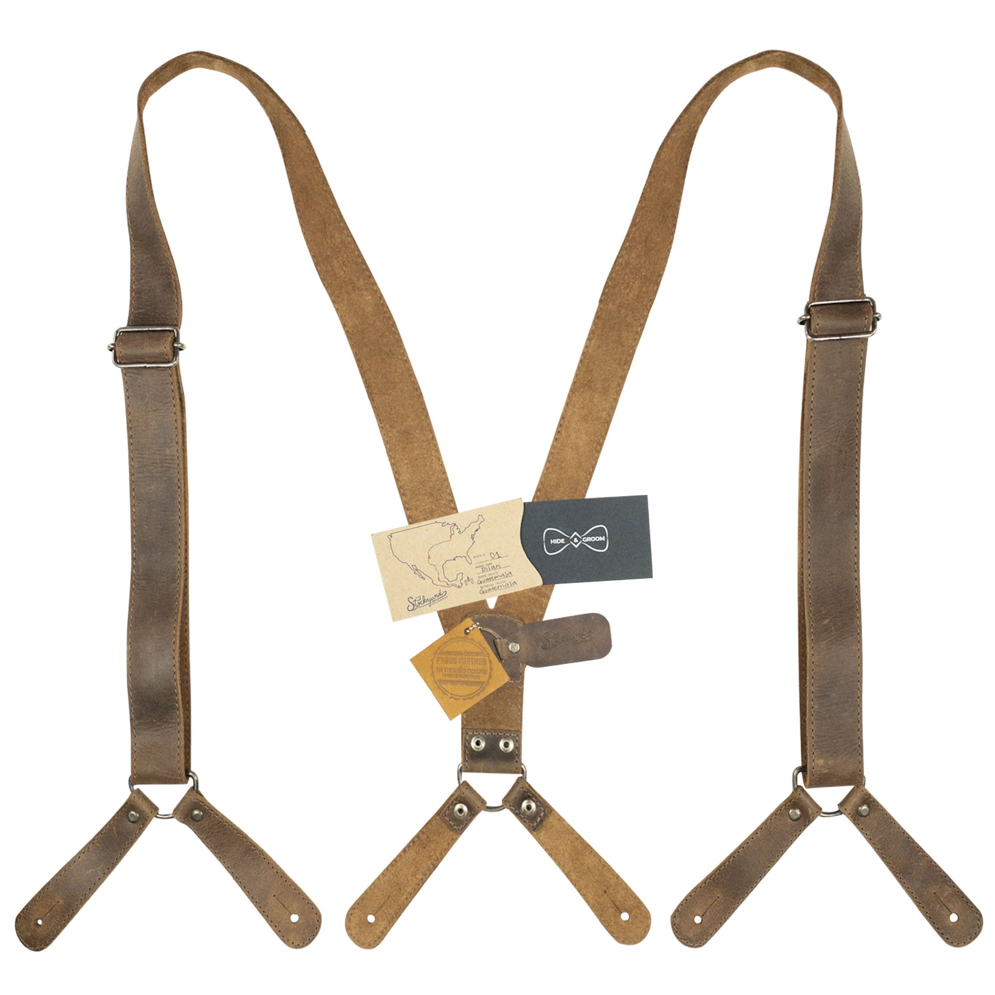 Rustic Button End Suspenders by Hide & Groom with accompanying gift card and tags, perfect for unique gifting. Made from durable full grain leather, ideal for groomsmen, best men, and bachelors attending wedding ceremonies or dinner parties. Each piece showcases artisan craftsmanship and small batch production in La Antigua Guatemala & Oaxaca Mexico.