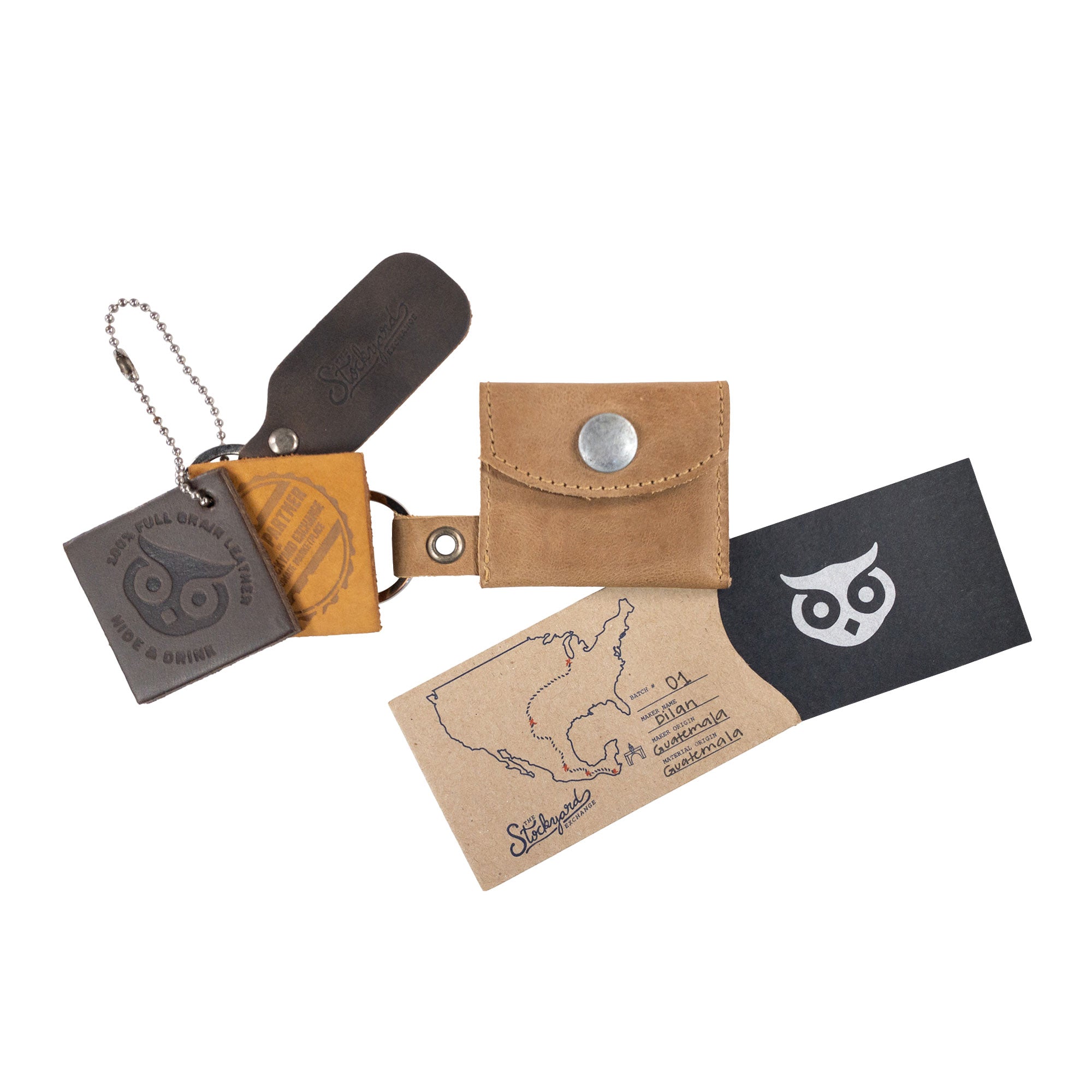 A unique perspective of the Tiny Coin Holder Keychain by Hide & Drink, depicting its versatility in storage. Made from reliable Full Grain Leather, this Tiny Coin Holder is an artisan piece of small batch production.