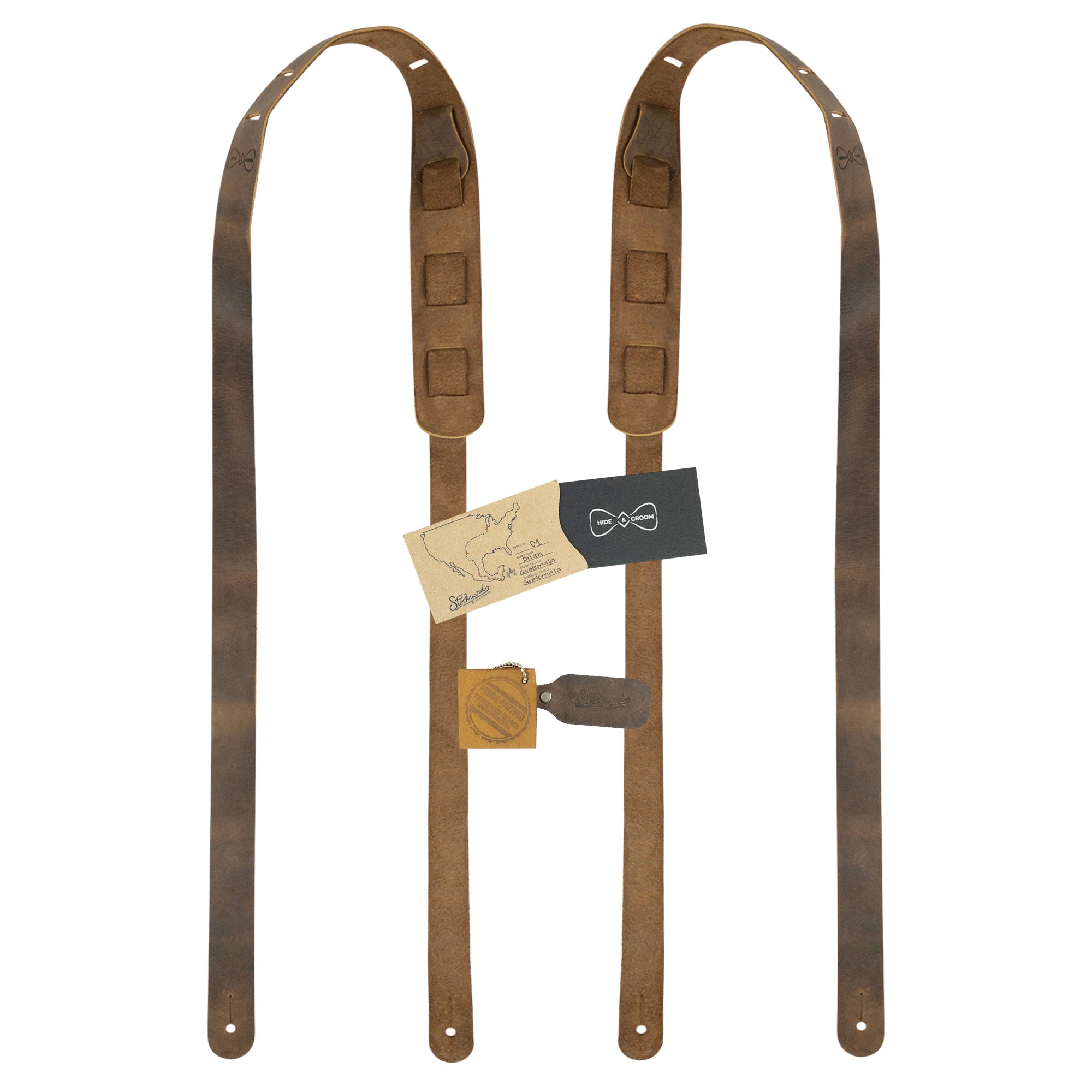 Complete set of Hide & Groom's Button End Suspenders, including branding and care information. These full grain leather suspenders are perfect for groomsmen and best men at weddings or dinner parties. Artisan crafted in La Antigua Guatemala with attention to detail.