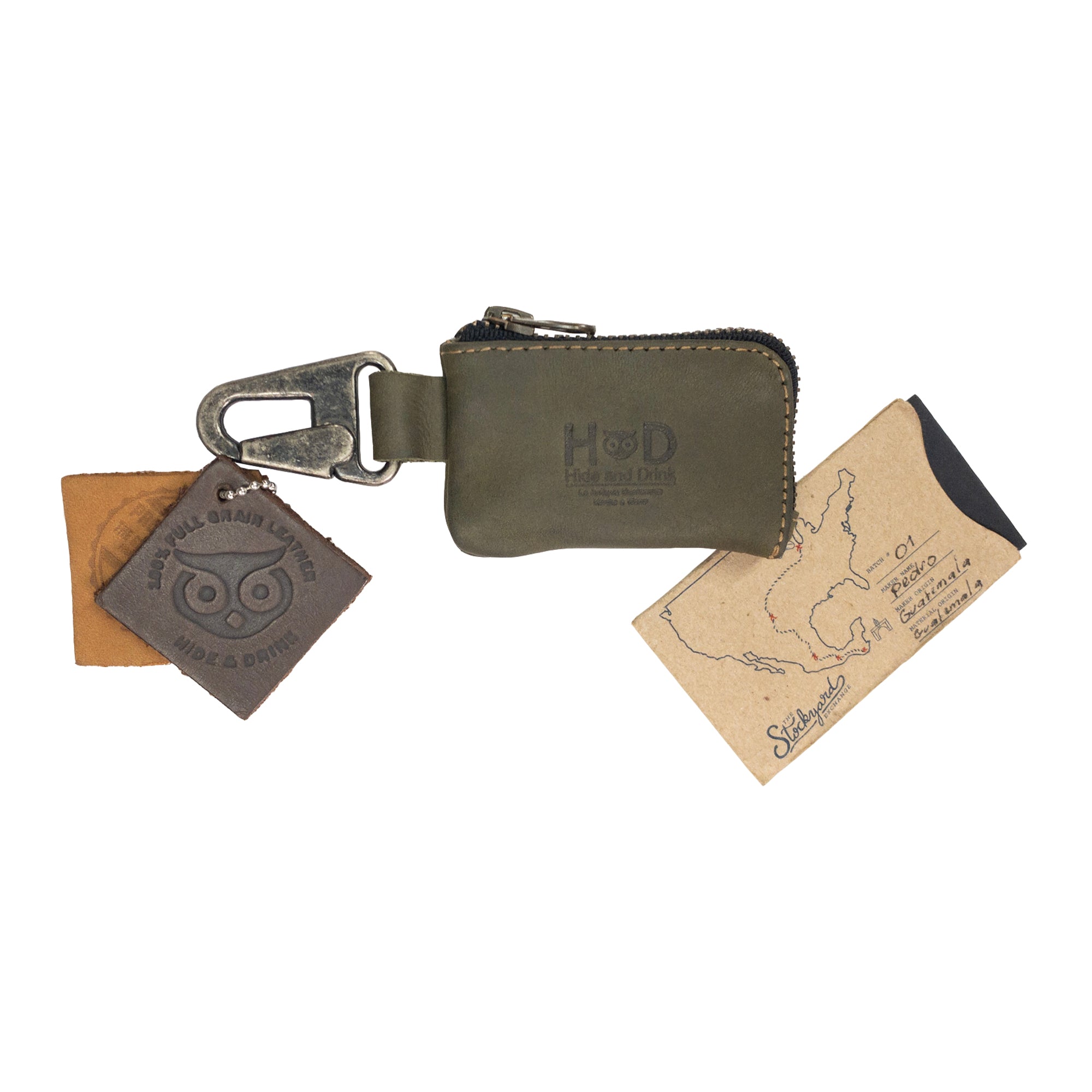 Hide & Drink Car Key Holder with cash and keys arranged neatly, demonstrating its versatility for holding headphone cables and memory cards, secured by a durable Nickel Metal Clasp. StockyardX, Small Batch Production, Hand Cut, Hand Sewn, Fire Branded, Artisan, Handmade in La Antigua Guatemala & Oaxaca Mexico.