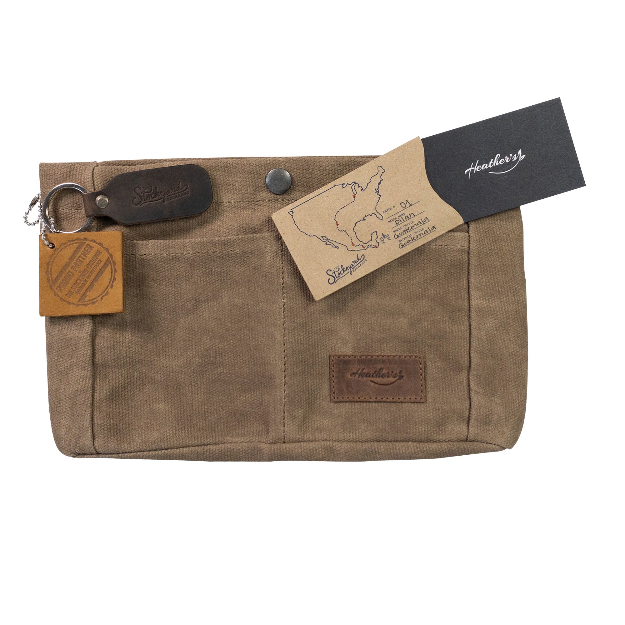 Heather's Purse Organizer Insert measuring 8.5 x 6 x 3 inches made from Waxed Canvas. Ideal for handbags and tote bags, it emphasizes the brand's commitment to artisan quality and offers handy cellphone storage, handmade in La Antigua Guatemala & Oaxaca Mexico.