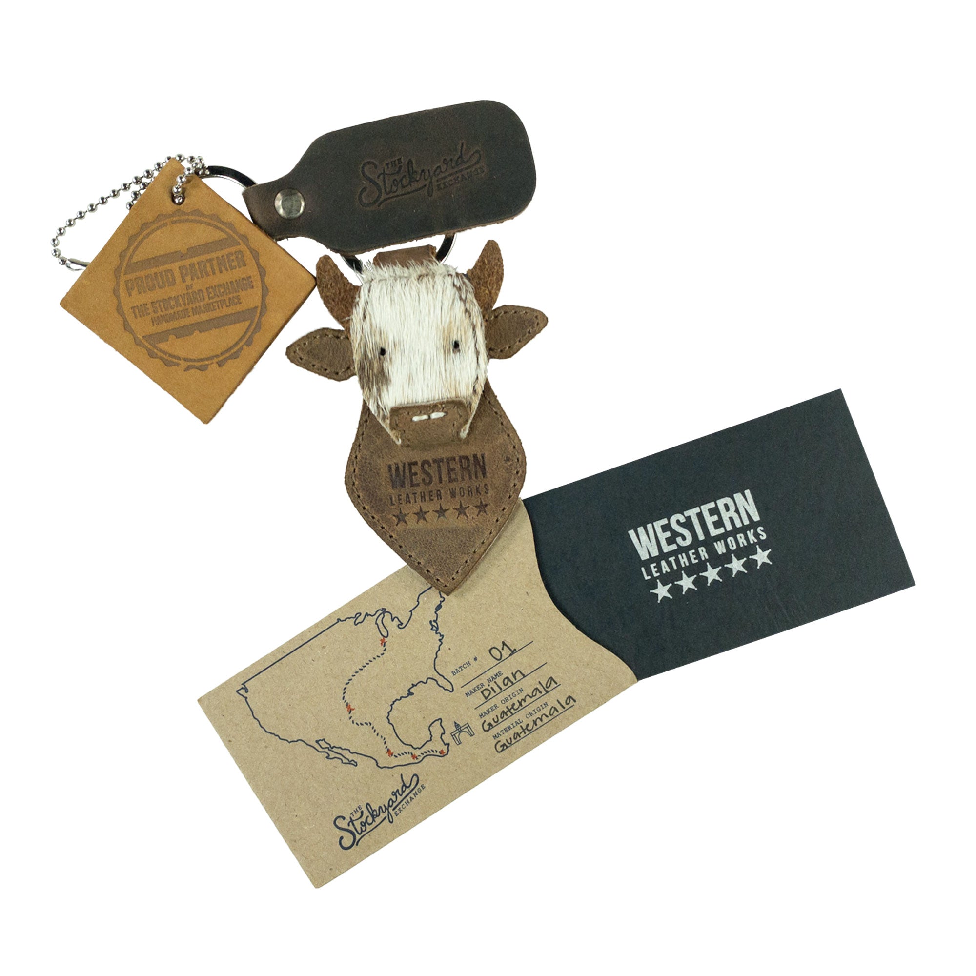 The Cow Head Keychain by Western Leather Works comes beautifully packaged, emphasizing the care in small batch production. This stunning key organizer combines functionality with a cowboy vibe, meticulously hand cut and sewn from full grain leather, showcasing the artisan heritage of La Antigua Guatemala.