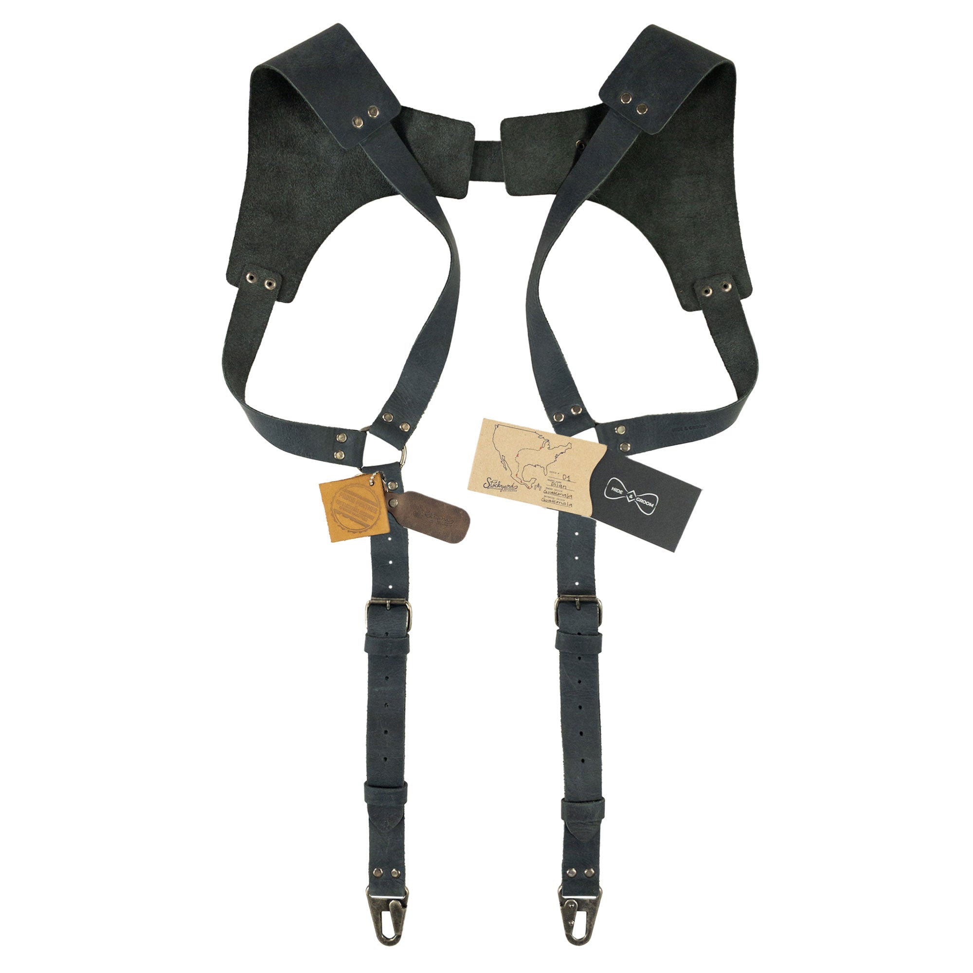 Styled front view of light leather Vintage Renaissance Suspenders by Hide & Groom, featuring an artisan-crafted design with durable metal hooks perfect for a vintage-inspired look.