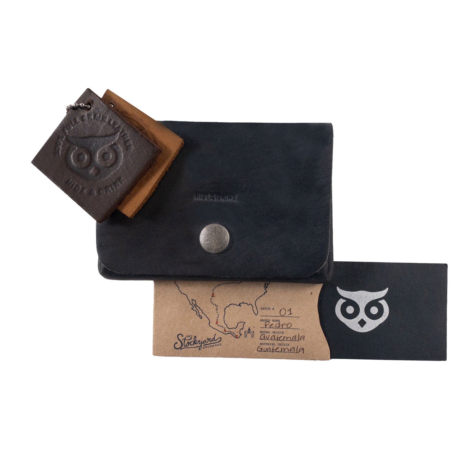Showcasing the content of the black Leather Double Pouch Card Wallet by Hide & Drink with additional leather products. This Leather Double Pouch Card Wallet serves as a great card organizer, cash holder, or ID case, perfect for men and women, crafted from Full Grain Leather in La Antigua Guatemala & Oaxaca Mexico.