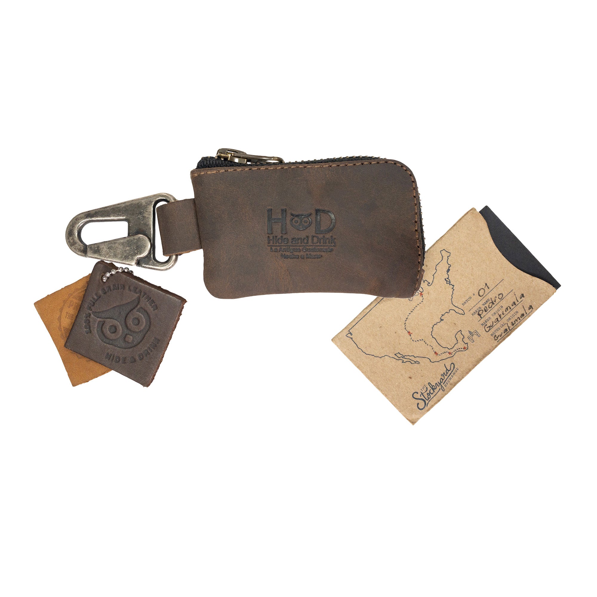 Hide & Drink Car Key Holder displayed with a gift card and branding tags, representing artisan quality and small batch production from La Antigua Guatemala & Oaxaca Mexico, ideal for gifting.