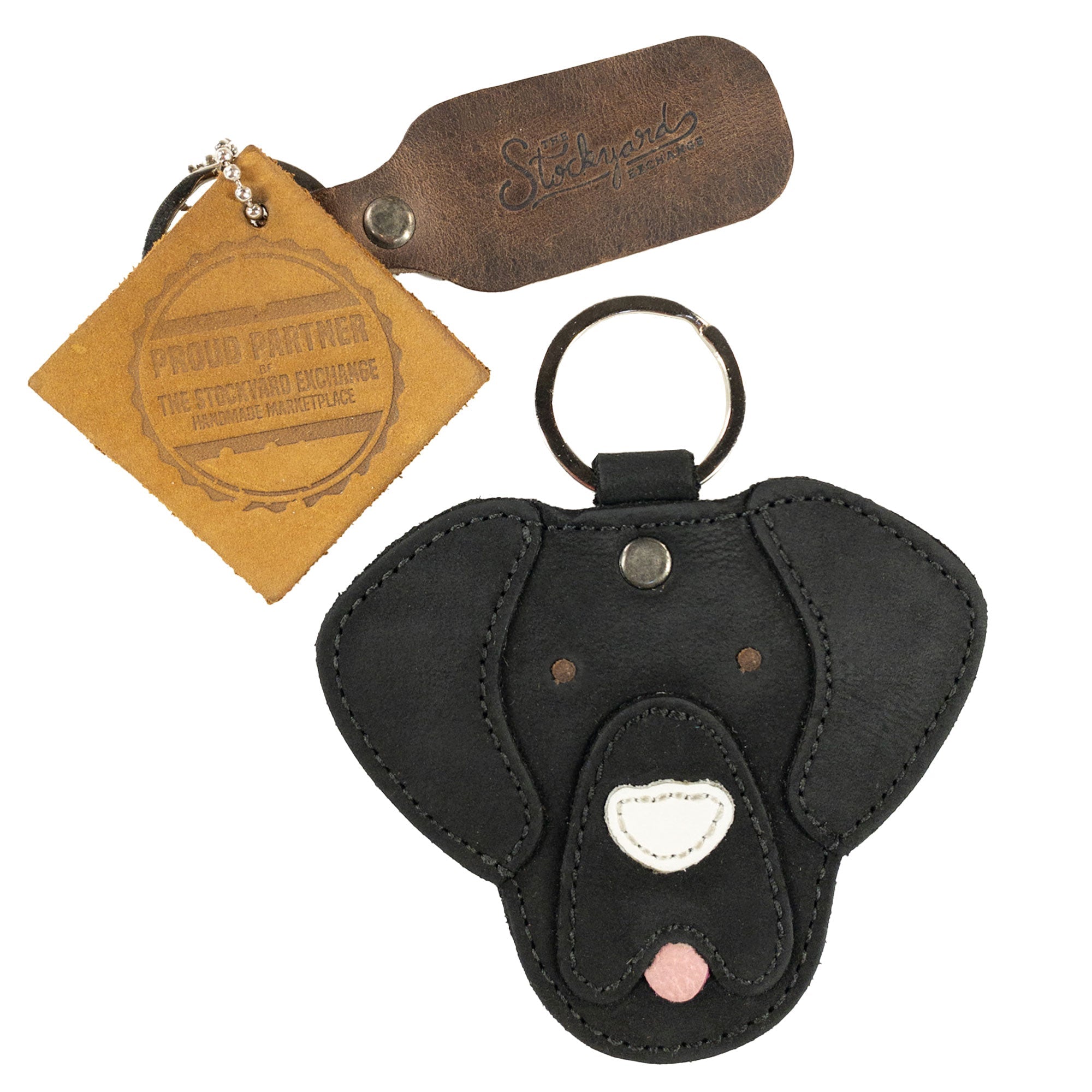 Labrador Dog Critter Keychain by Taco Dog displayed with its tag, highlighting its artisan quality. This unique keychain made from Full Grain Leather features handcrafted details and small batch production, making it ideal for dog lovers.
