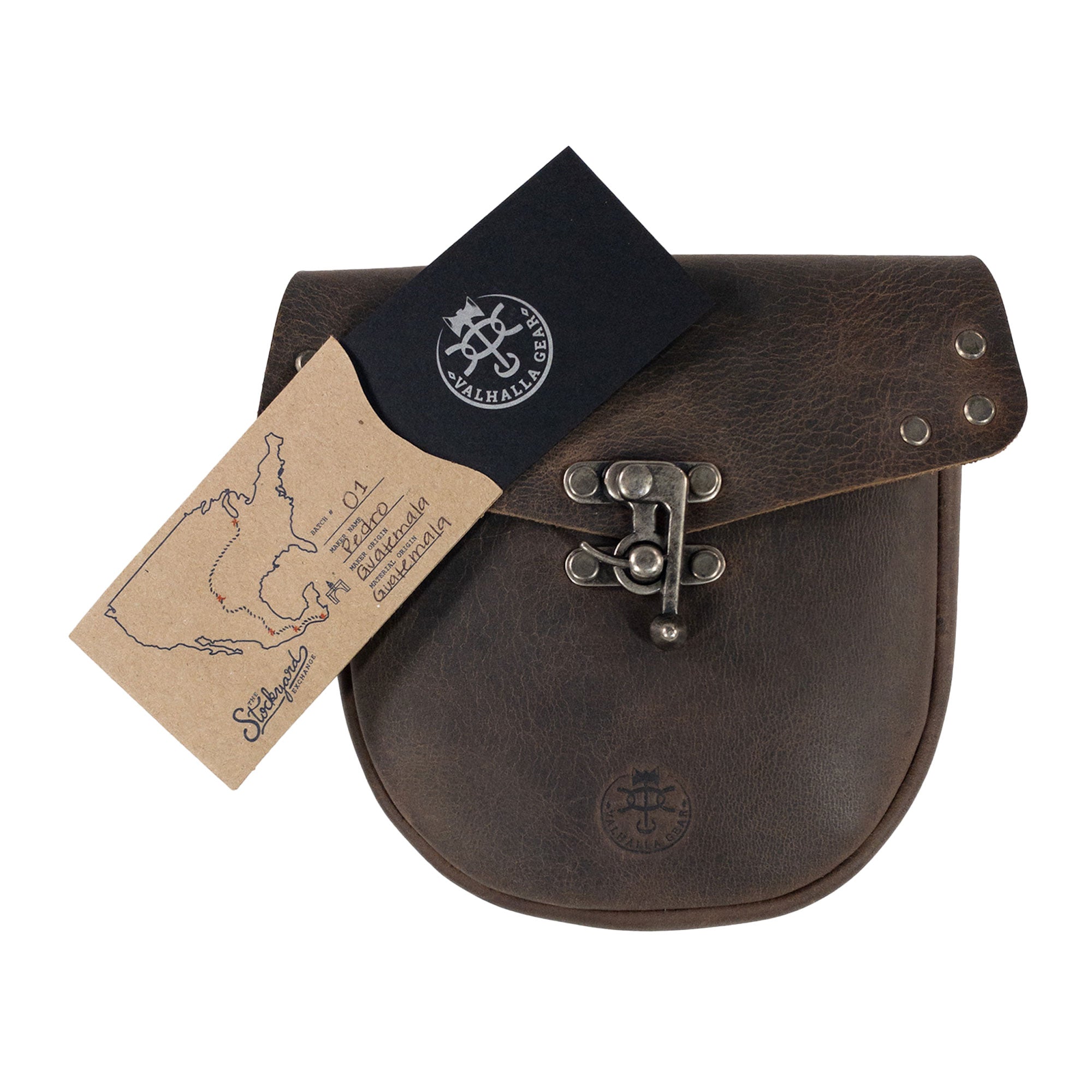 The Vintage Belt Pouch from Valhalla Gear, featuring a tag that speaks to its artisan craftsmanship and full grain leather quality, perfect for carrying small notebooks and personal items, handmade in Guatemala.