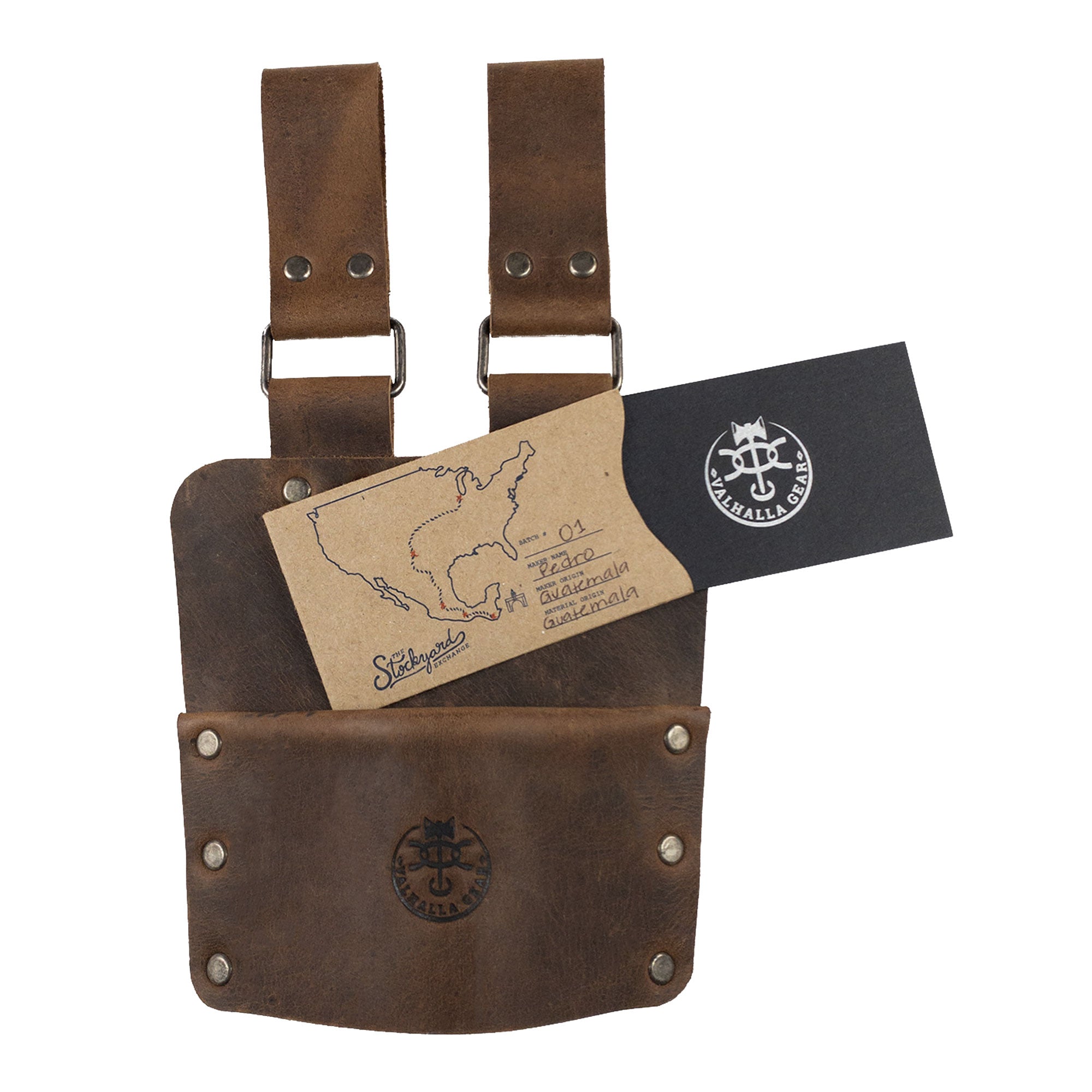 The Axe Holster, Durable Carrier for Lumberjack by Valhalla Gear, presented with a care card showing its artisan heritage. Made with full grain leather, it serves as a reliable accessory for tools, ensuring safety and convenience for home improvement, handcrafted in La Antigua Guatemala.