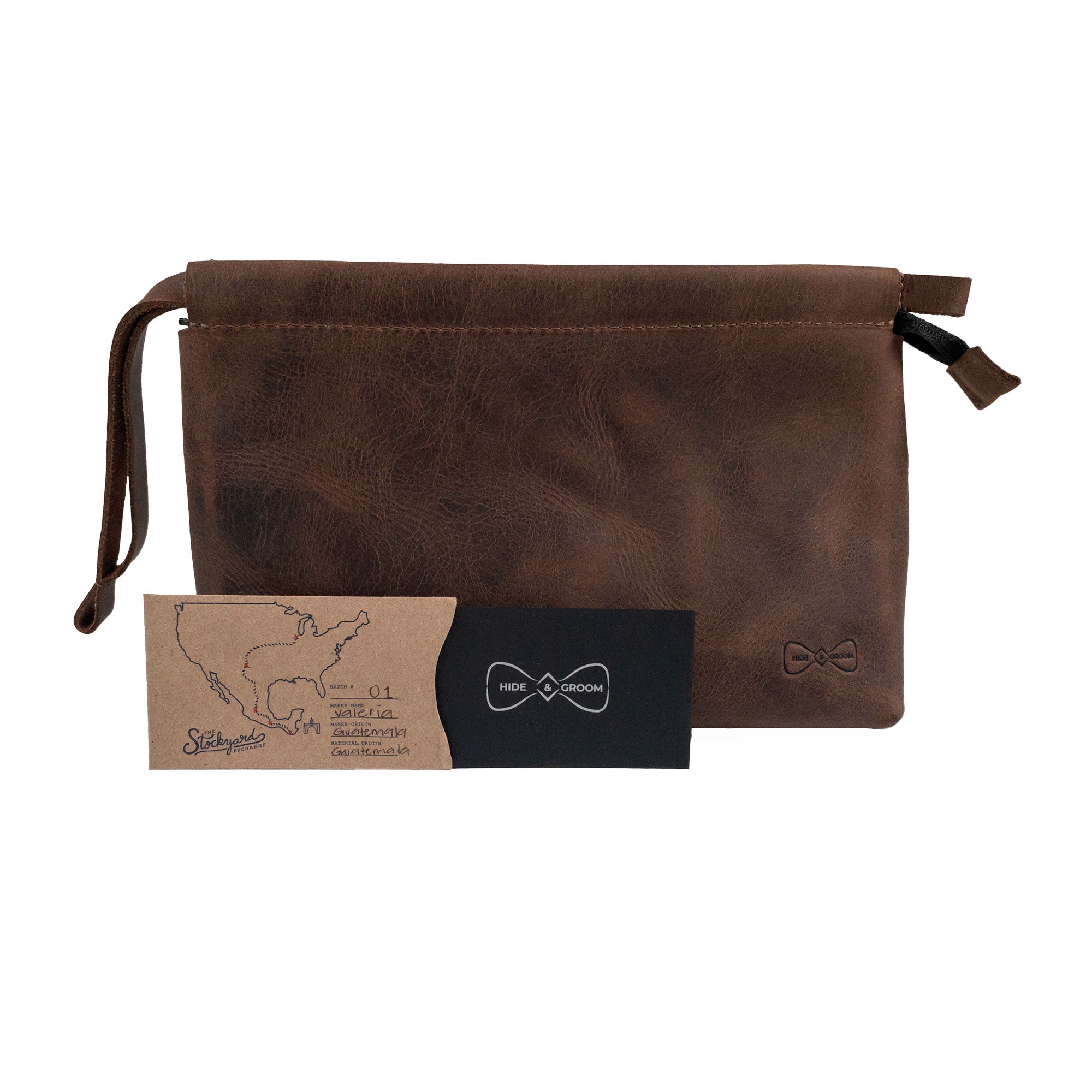 The stylish Rectangular Toiletry Bag with Sliding Handle for Groomsmen by Hide & Groom, showing its dimensions clearly for practical use. Made from full grain leather, this artisan-crafted bag is perfect for shaving kit storage and serves as an ideal travel companion for best men.