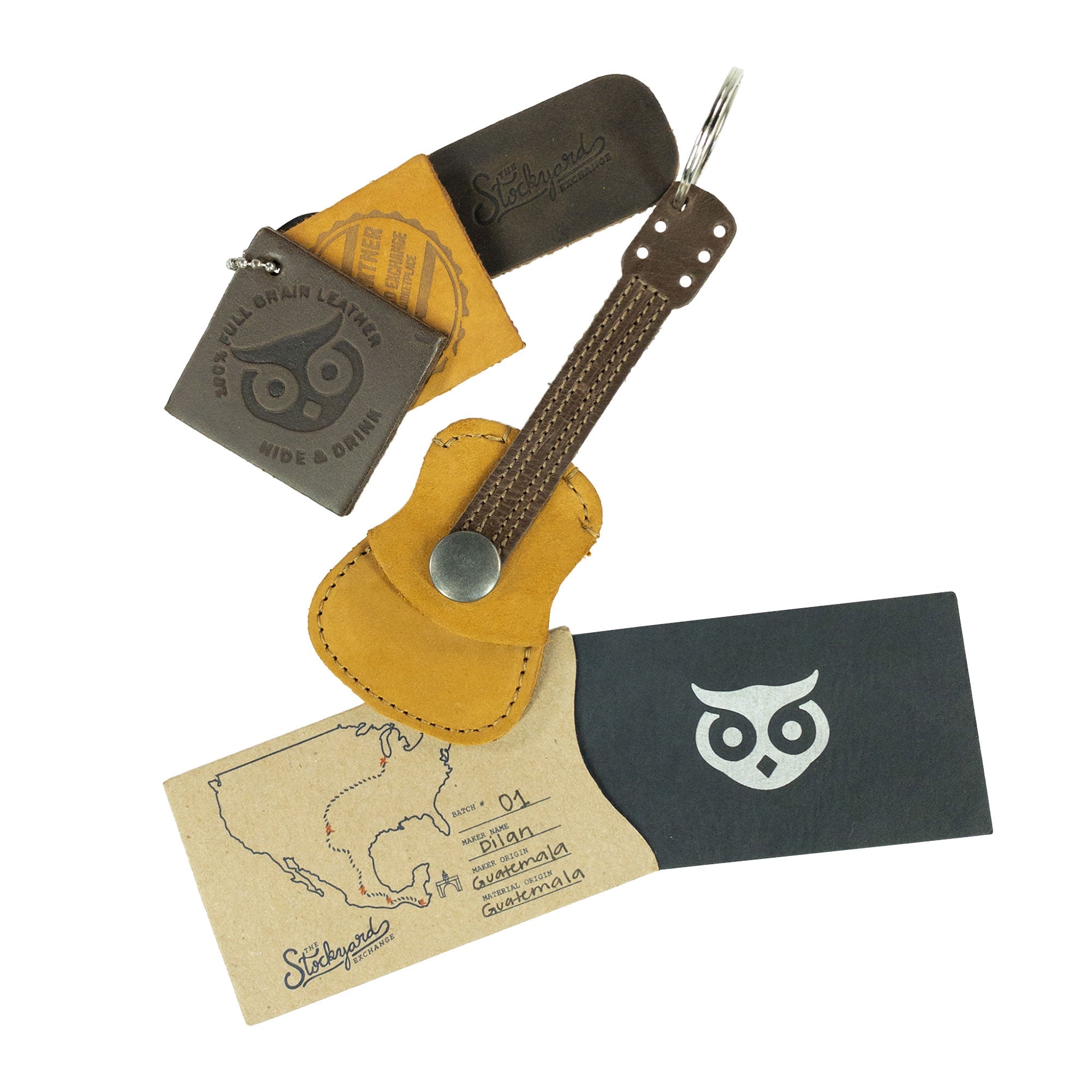 Hide & Drink Guitar Pick Holder with branding and packaging, showcasing its Leather Guitar Pick Holder Keychain design. A unique picks case instrument gift idea for musicians, made from full grain leather with artisan craftsmanship in La Antigua Guatemala.