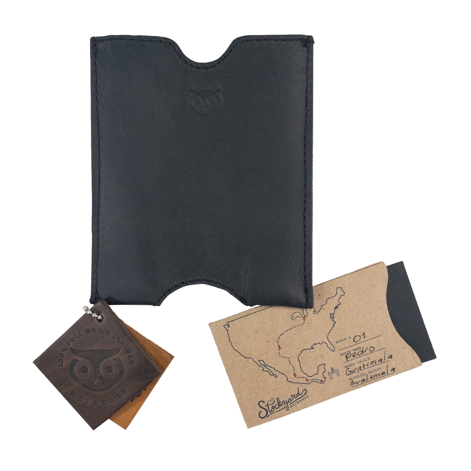 Hide & Drink Passport Sleeve showcasing a unique leather tag, emphasizing its small batch production. This handmade Travel Passport Pocket Sleeve, crafted from Full Grain Leather, represents true artisan quality from La Antigua Guatemala & Oaxaca Mexico.