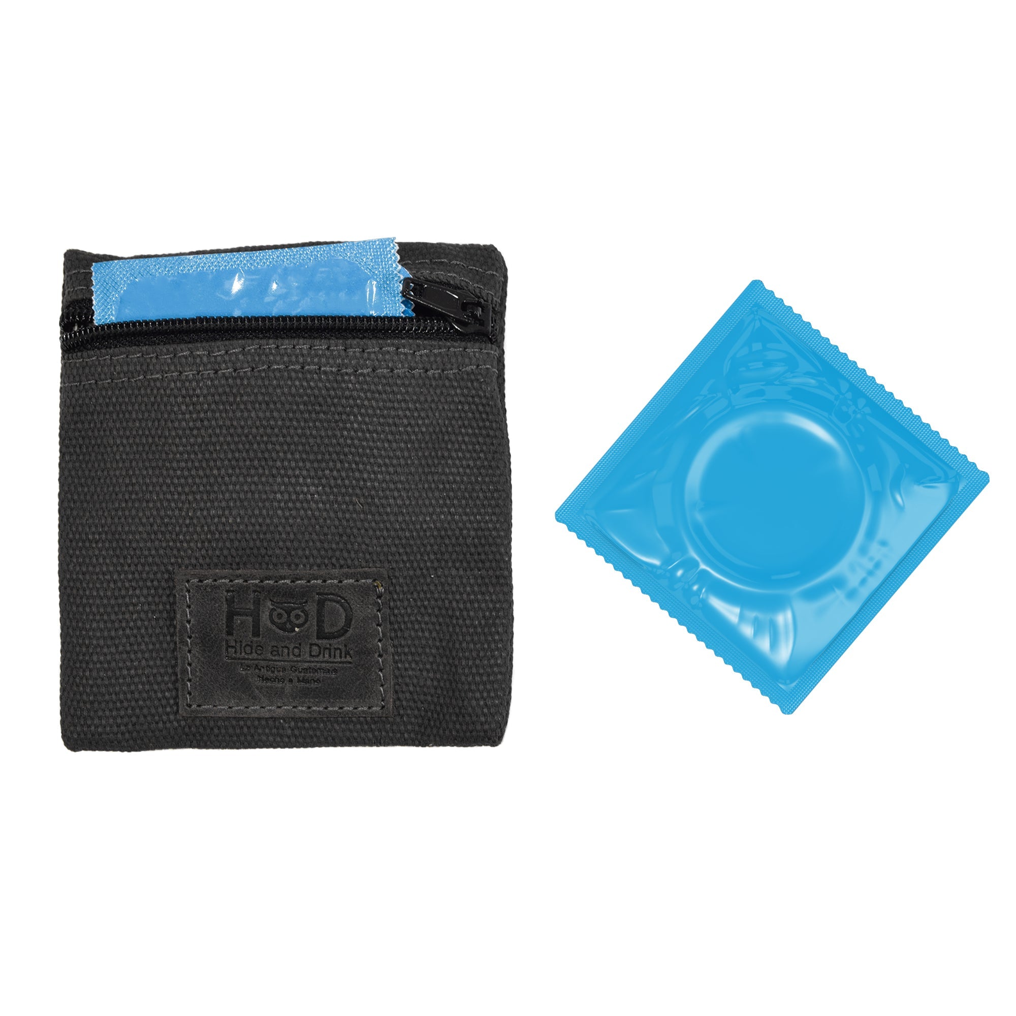 Hide & Drink Condom Pouch presented with essential dimensions, crafted from robust water resistant waxed canvas. This artisan pocket purse makes a classic partner gift ideal for travel. Handmade in La Antigua Guatemala reflects small batch craftsmanship.