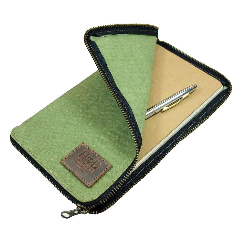 Inside view of the Waxed Canvas Zippered Journal Cover for Moleskine (Notebook NOT Included) by Hide & Drink, ready for notes with a chic green Canvas interior. Ideal for Cahier Cases and crafted from Full Grain Leather by artisans from La Antigua Guatemala & Oaxaca Mexico.