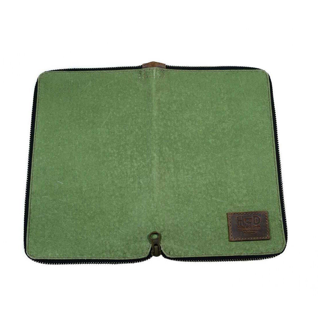 Inside of the Waxed Canvas Zippered Journal Cover for Moleskine (Notebook NOT Included) by Hide & Drink, ready for use with its unique green Canvas interior. Perfect as a Cahier Case, made with Full Grain Leather by artisans from La Antigua Guatemala & Oaxaca Mexico.